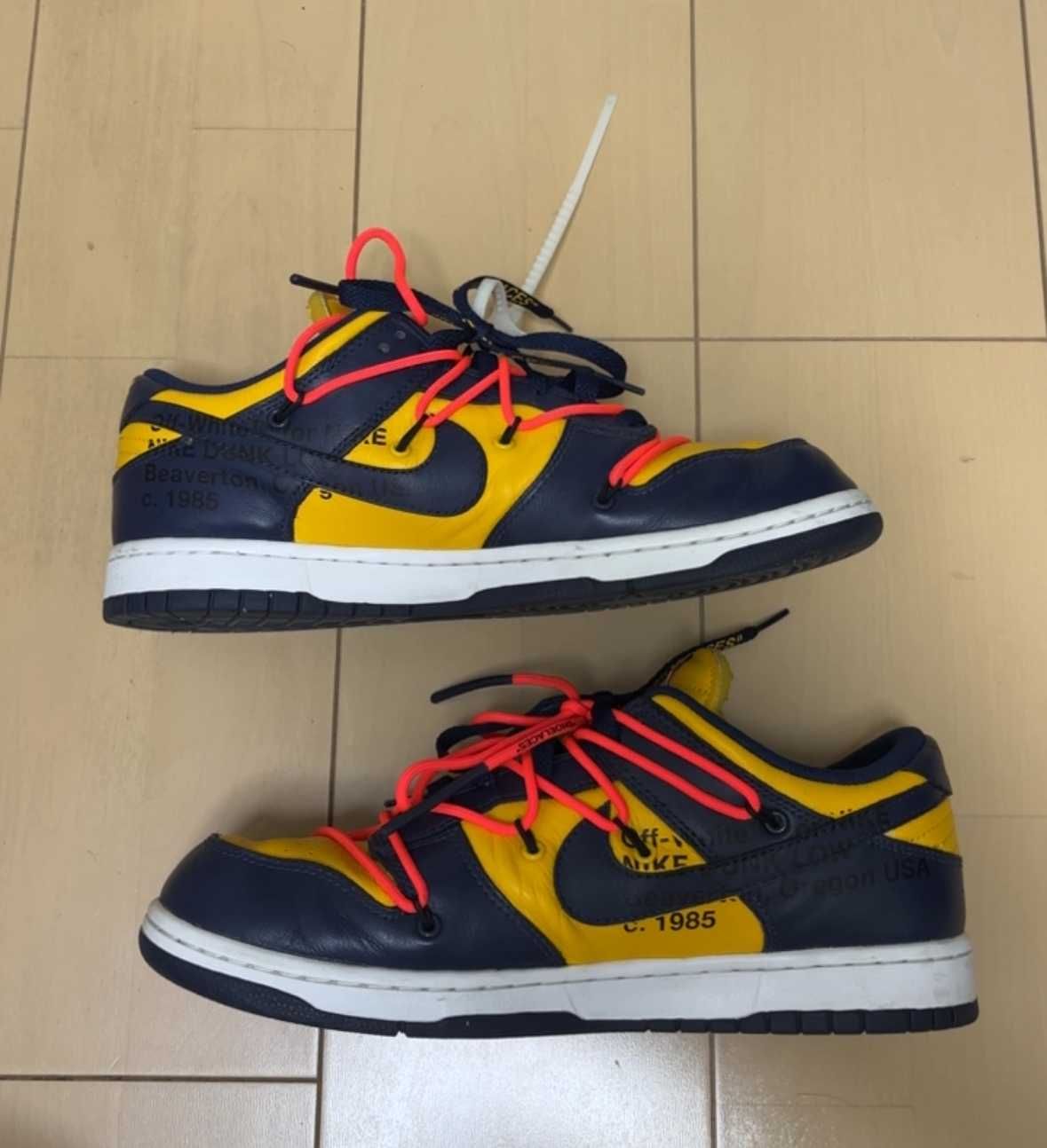Off-White × Nike Dunk Low LTHR "University Gold/Midnight Navy/White"