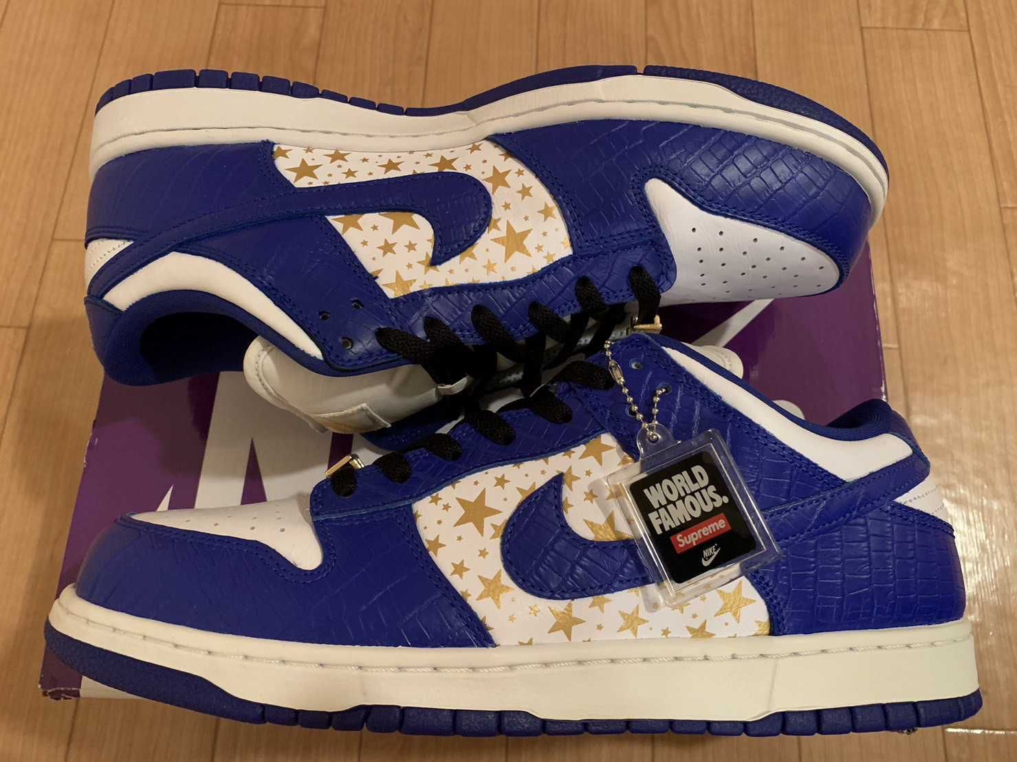 Supreme × Nike SB Dunk Low OG QS Gold Stars "White/Hyper Blue"