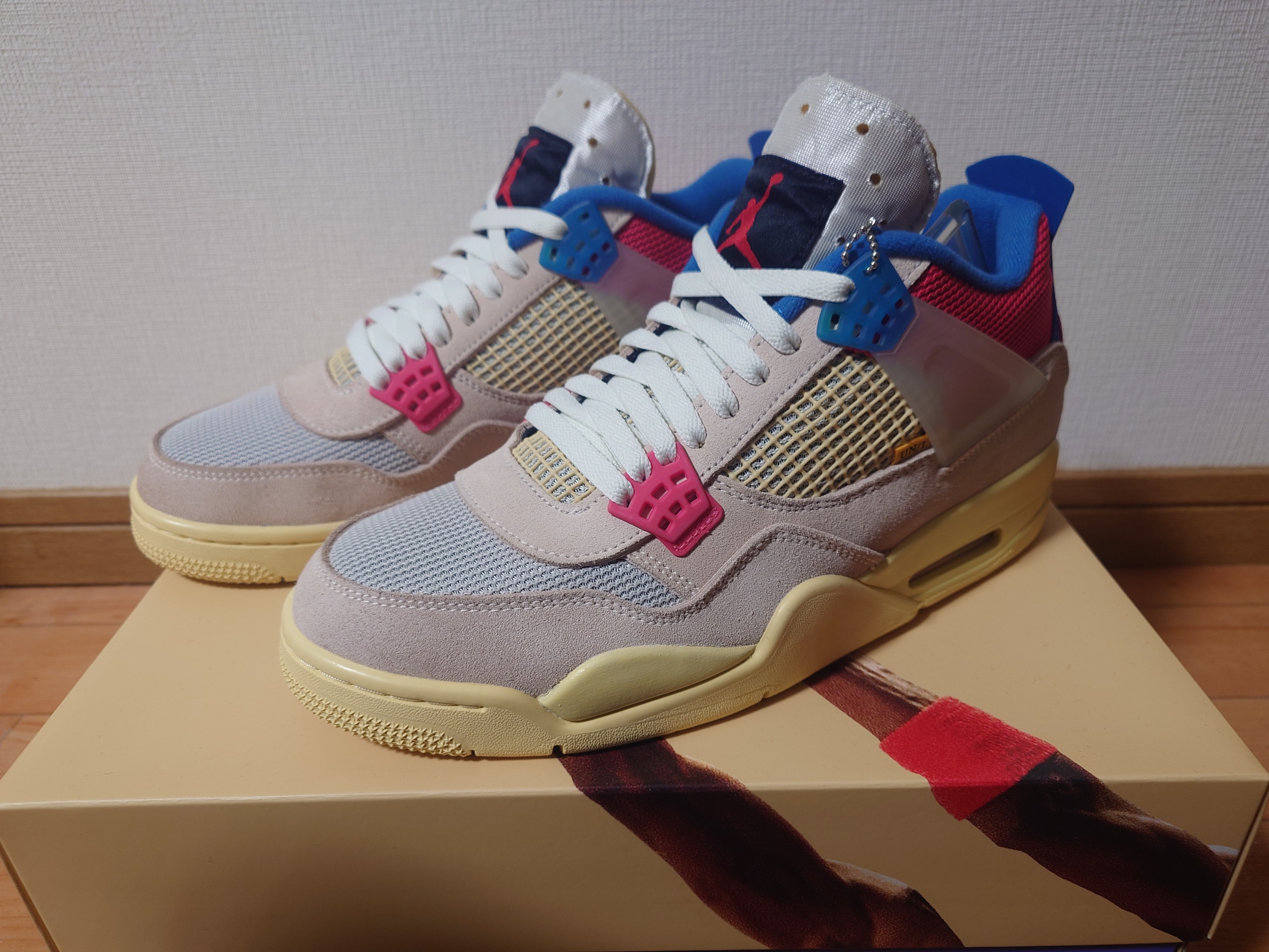 UNION × Nike Air Jordan 4 SP "Guava Ice/Light Fusion Red"