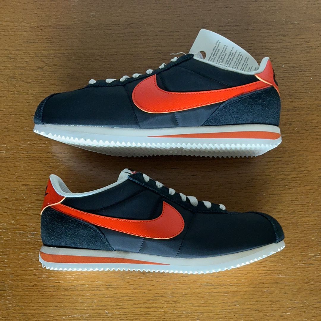 Nike Cortez Textile "Black/Sail/Muslin/Safety Orange"