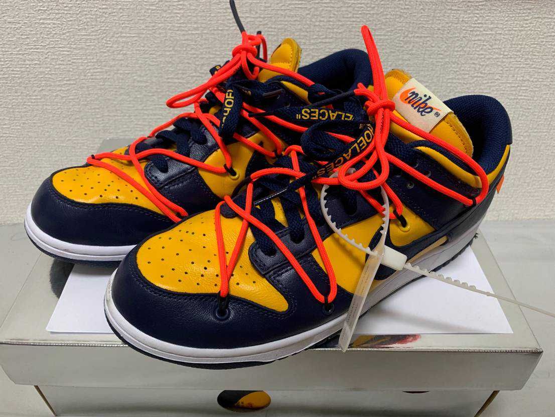Off-White × Nike Dunk Low LTHR "University Gold/Midnight Navy/White"