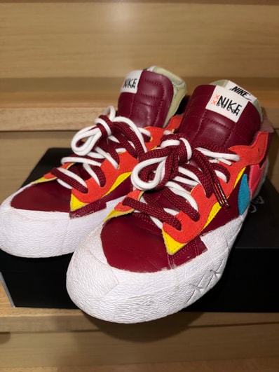 KAWS × sacai × Nike Blazer Low "Team Red"