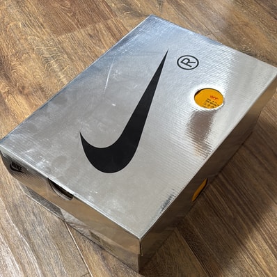 Off-White × Nike Air Rubber Dunk "White/University Blue"