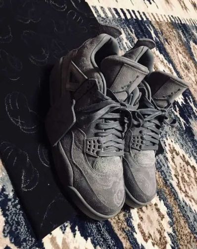 KAWS × Nike Air Jordan 4 Retro "Grey"