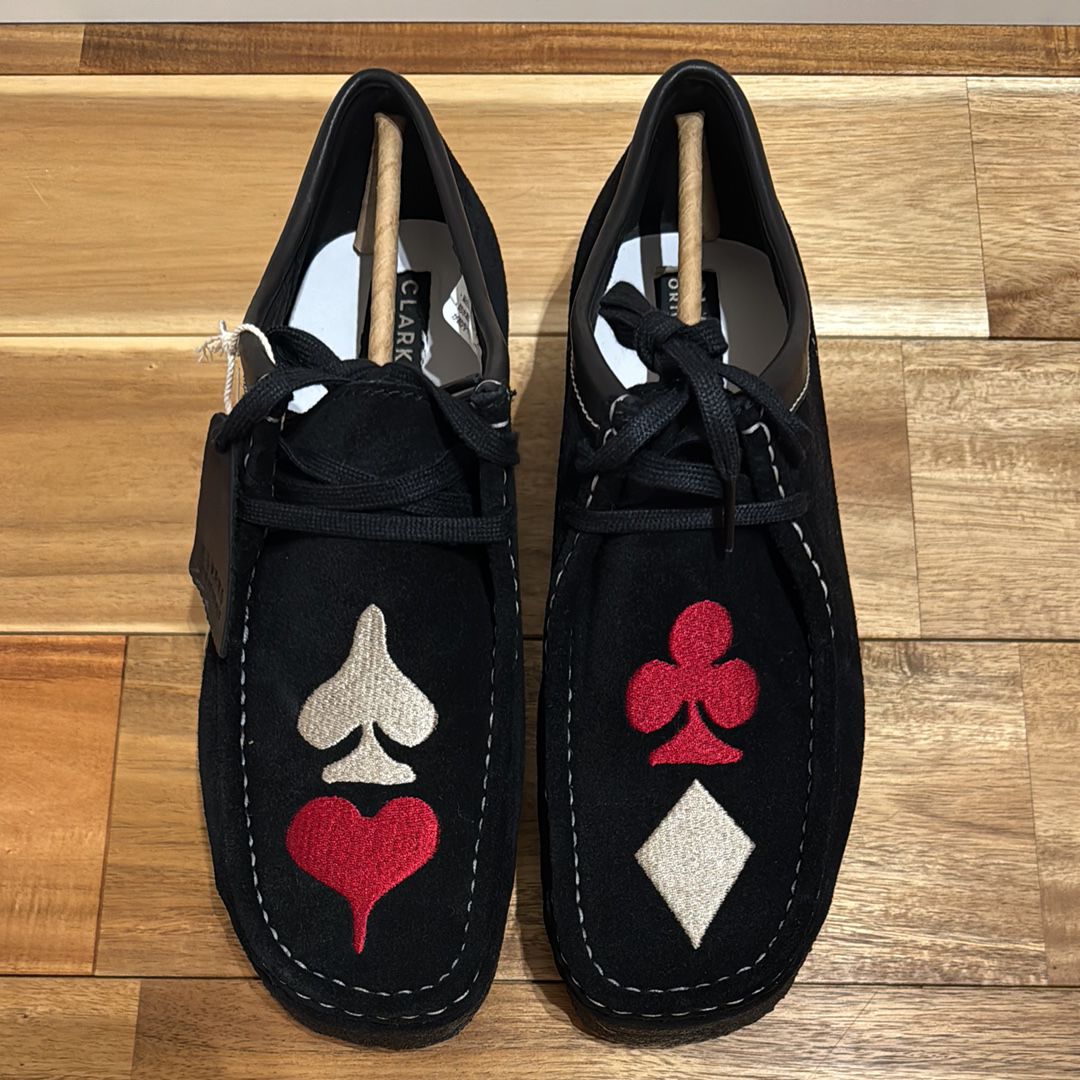 Stussy × Clarks Wallabee "Black Suede/Red/Gold"