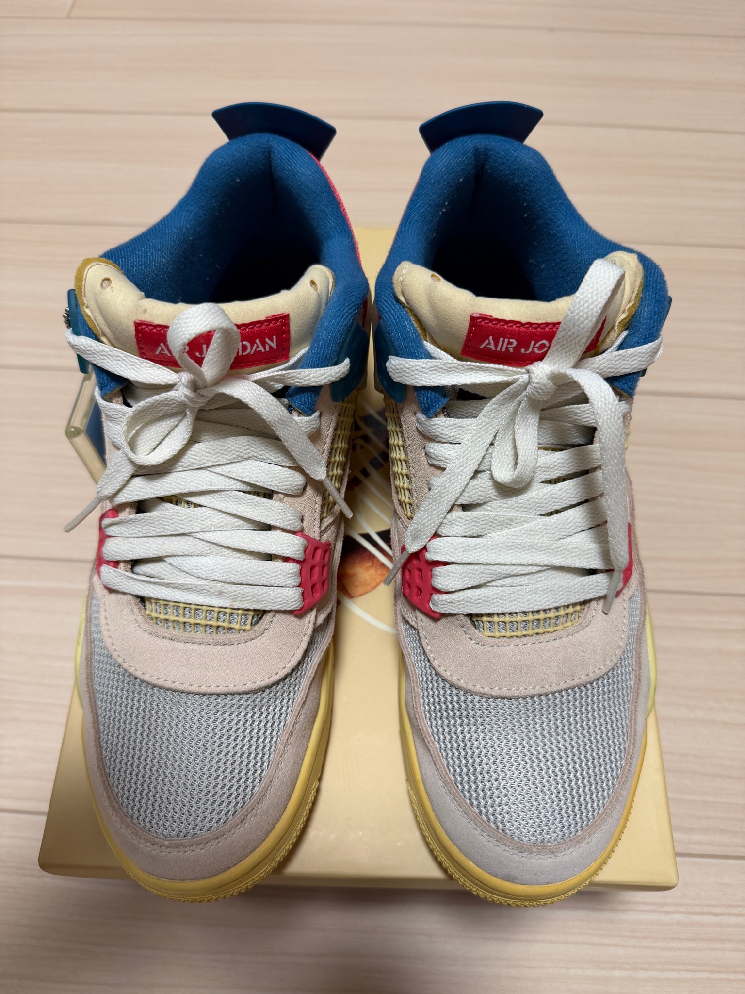 UNION × Nike Air Jordan 4 SP "Guava Ice/Light Fusion Red"