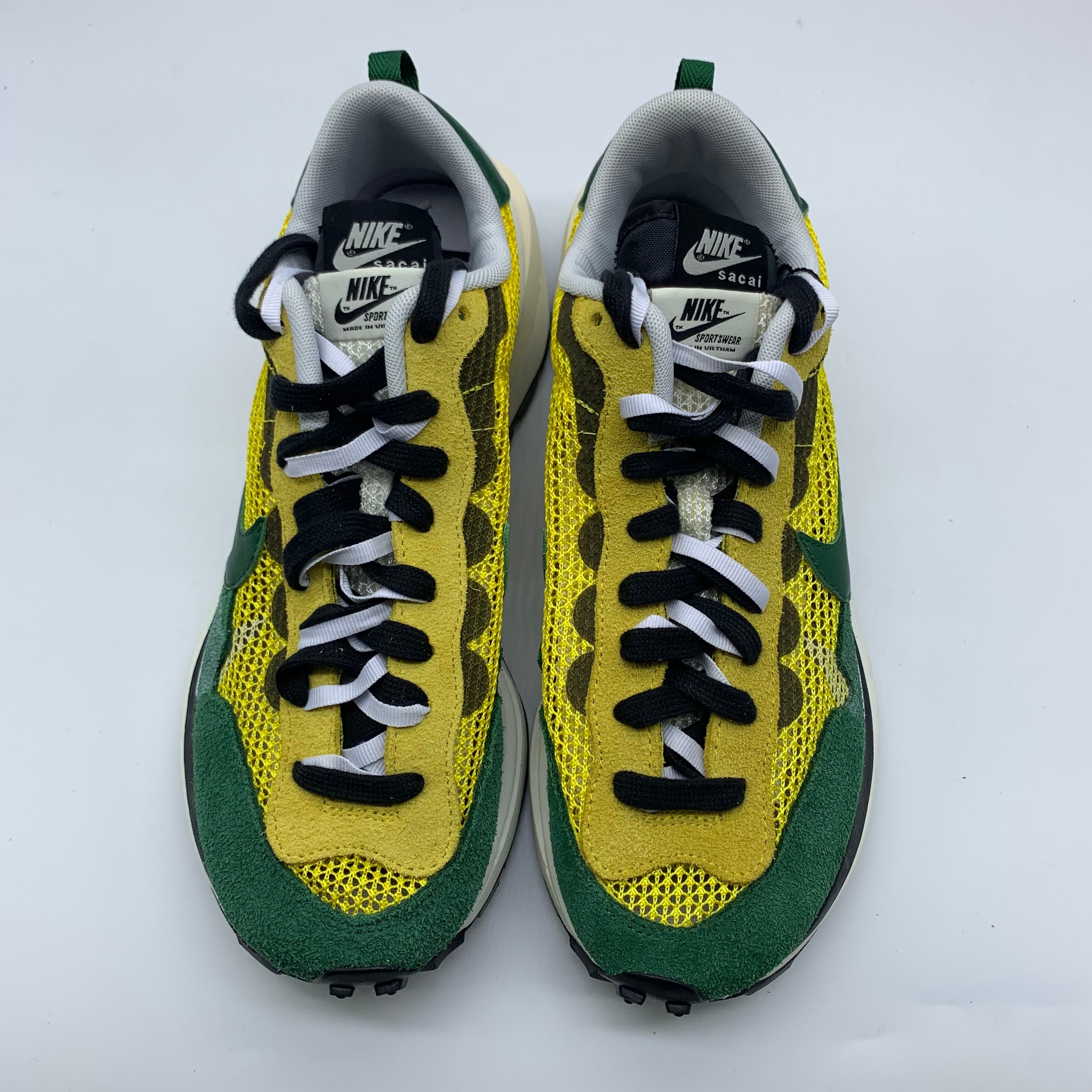 sacai × Nike Vapor Waffle "Tour Yellow/Stadium Green-Sail"