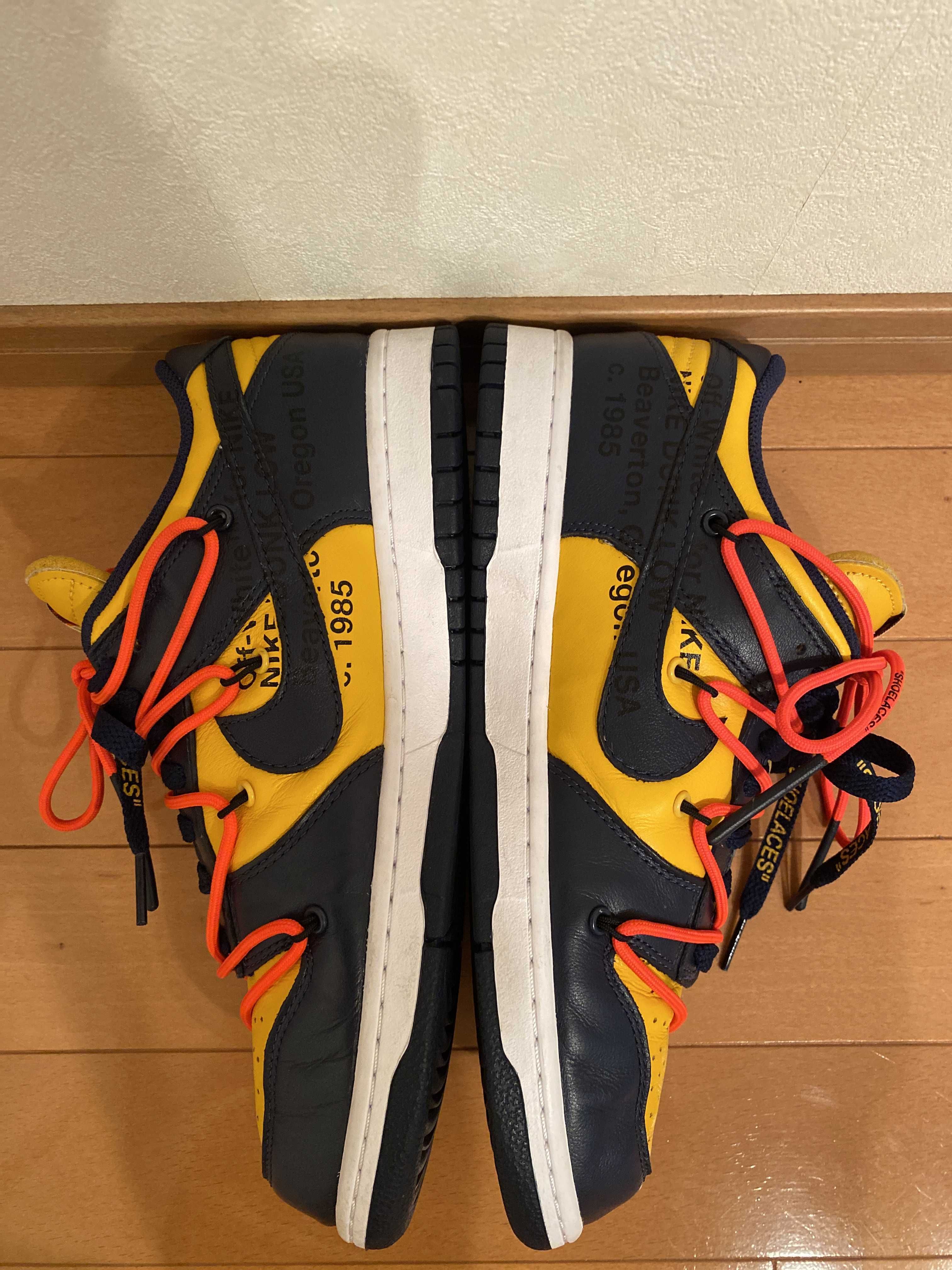 Off-White × Nike Dunk Low LTHR "University Gold/Midnight Navy/White"