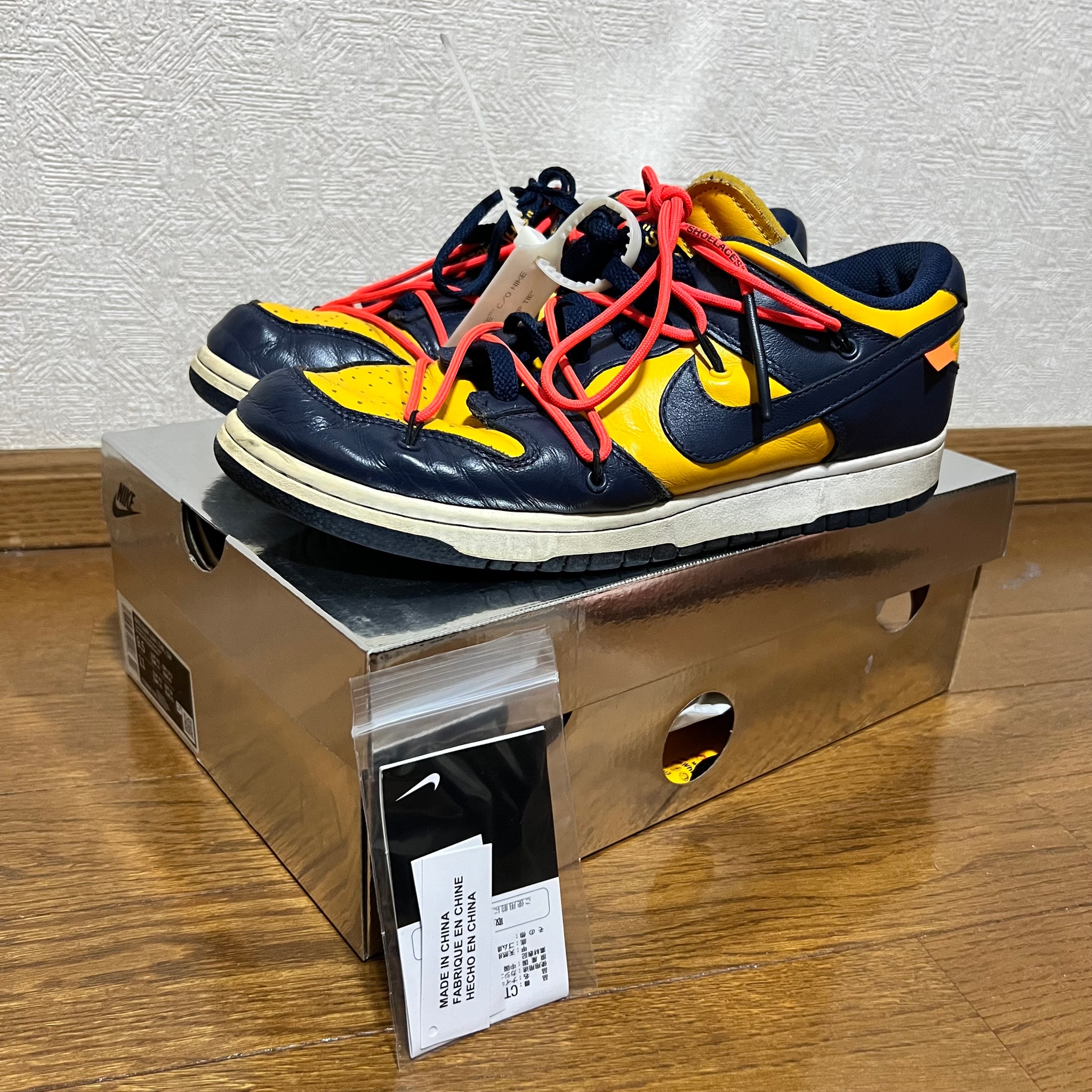 Off-White × Nike Dunk Low  LTHR "University Gold/Midnight Navy/White"