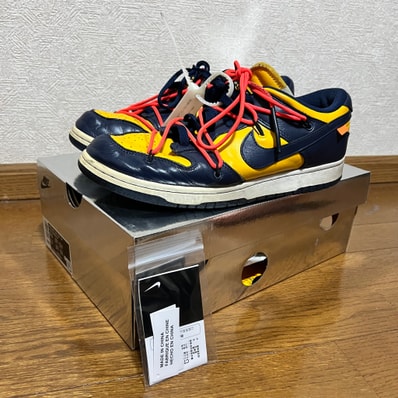 Off-White × Nike Dunk Low LTHR "University Gold/Midnight Navy/White"