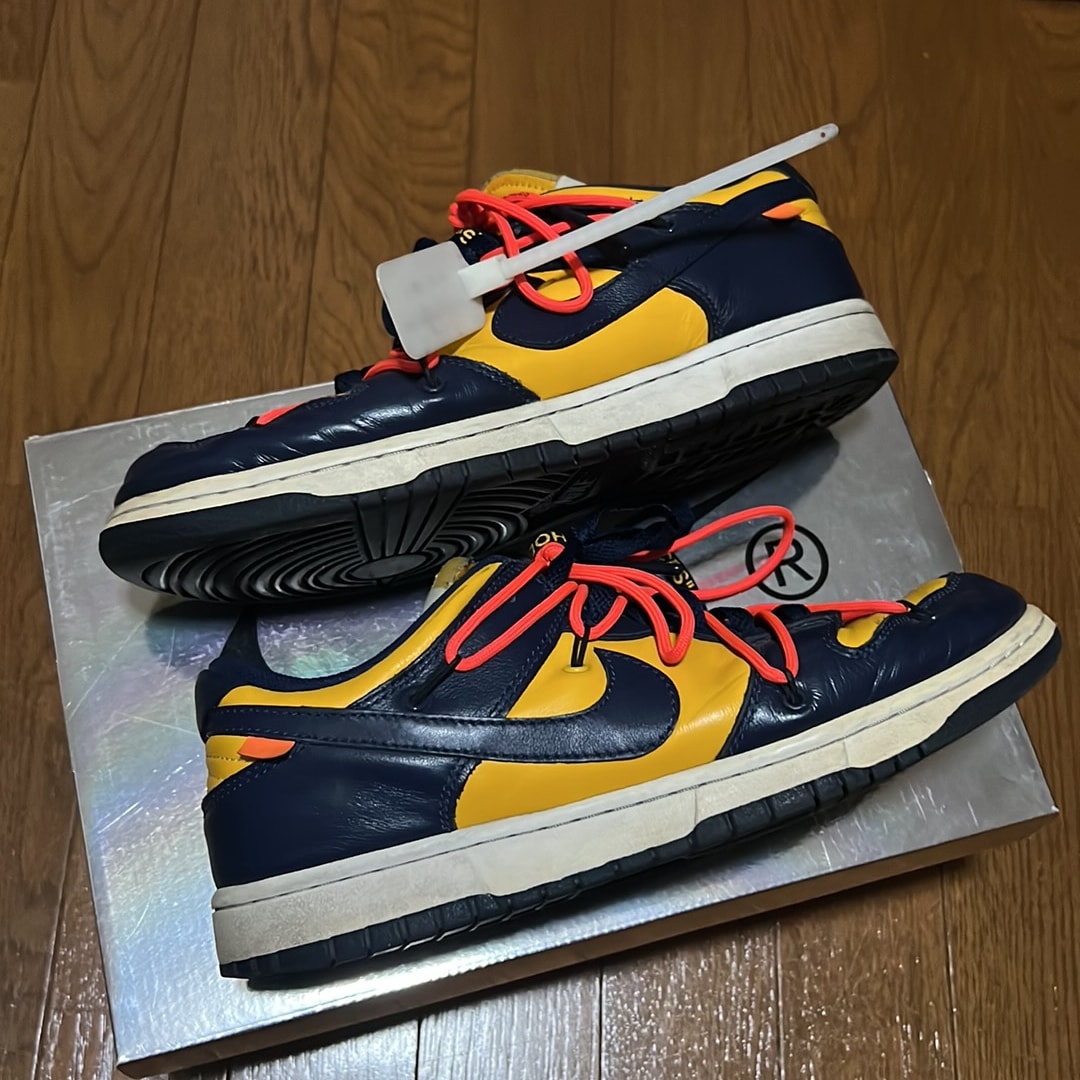Off-White × Nike Dunk Low LTHR "University Gold/Midnight Navy/White"