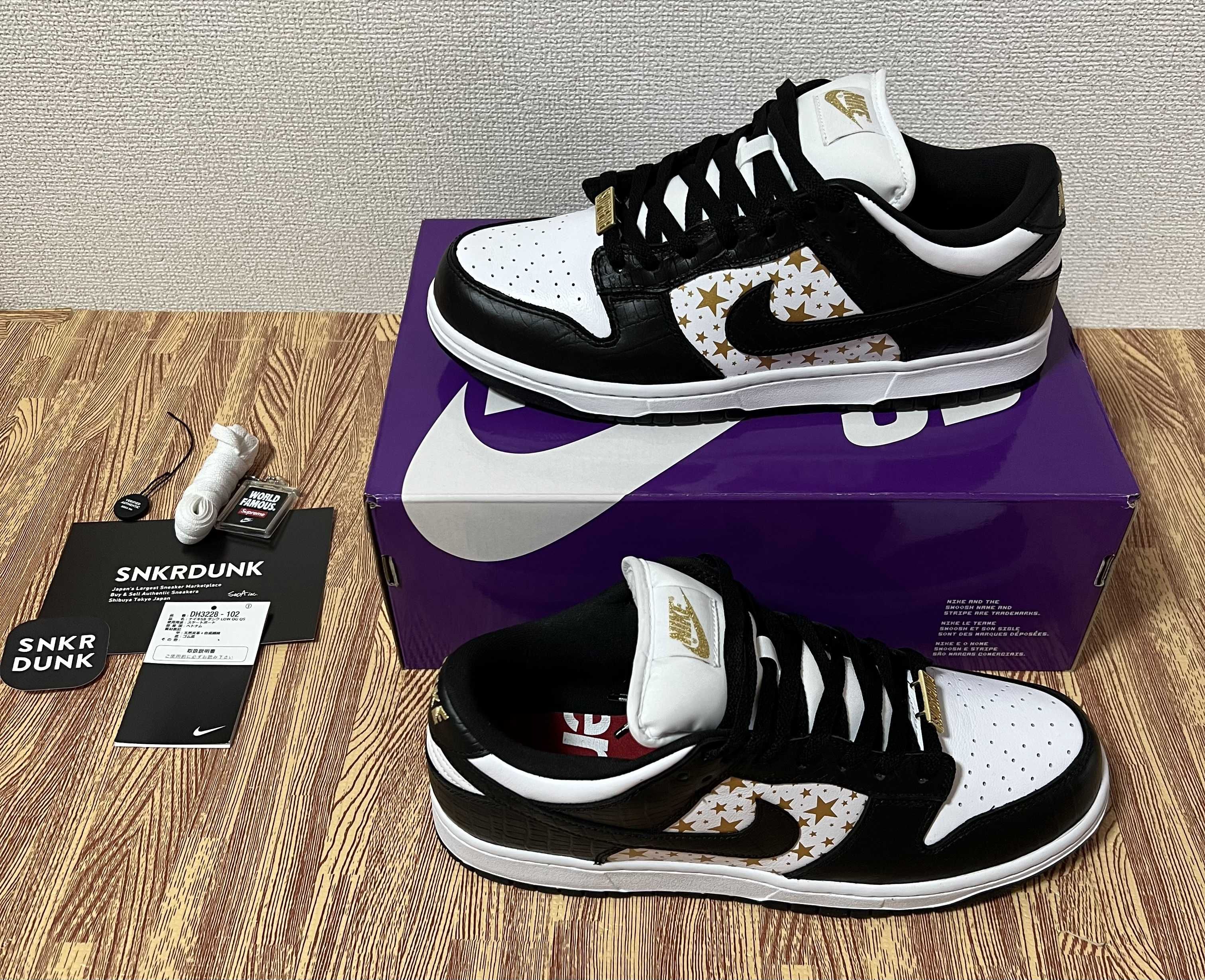 Supreme × Nike SB Dunk Low OG QS Gold Stars "White/Black"