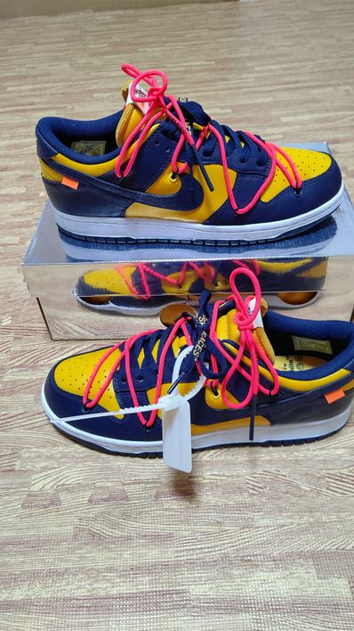 Off-White × Nike Dunk Low LTHR "University Gold/Midnight Navy/White"