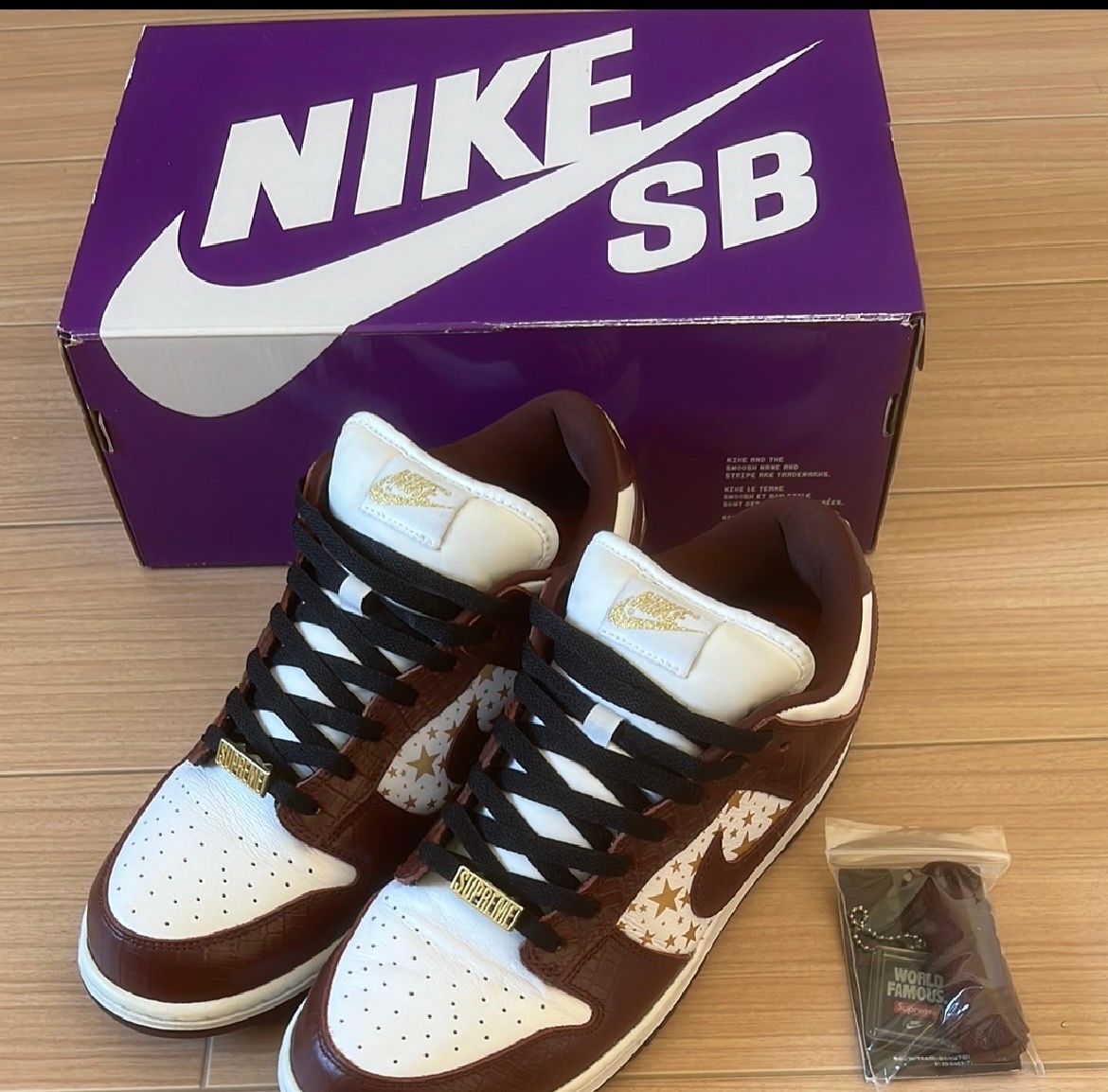 Supreme × Nike SB Dunk Low OG QS Gold Stars "White/Barkroot Brown"