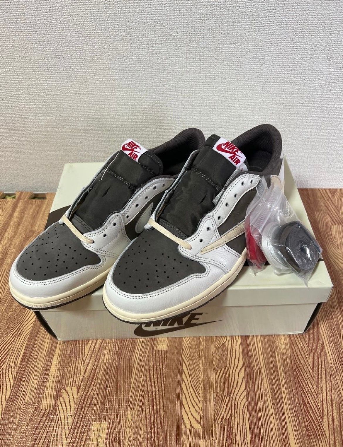 Travis Scott × Nike Air Jordan 1 Low OG SP "Reverse Mocha/Sail and Ridgerock"