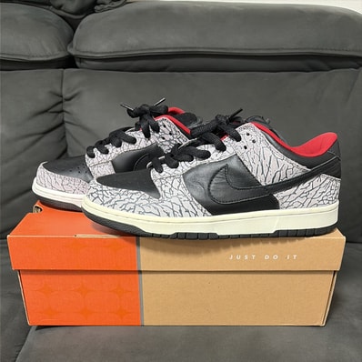 Supreme × Nike SB Dunk Low "Black Cement/Safari" (2002)