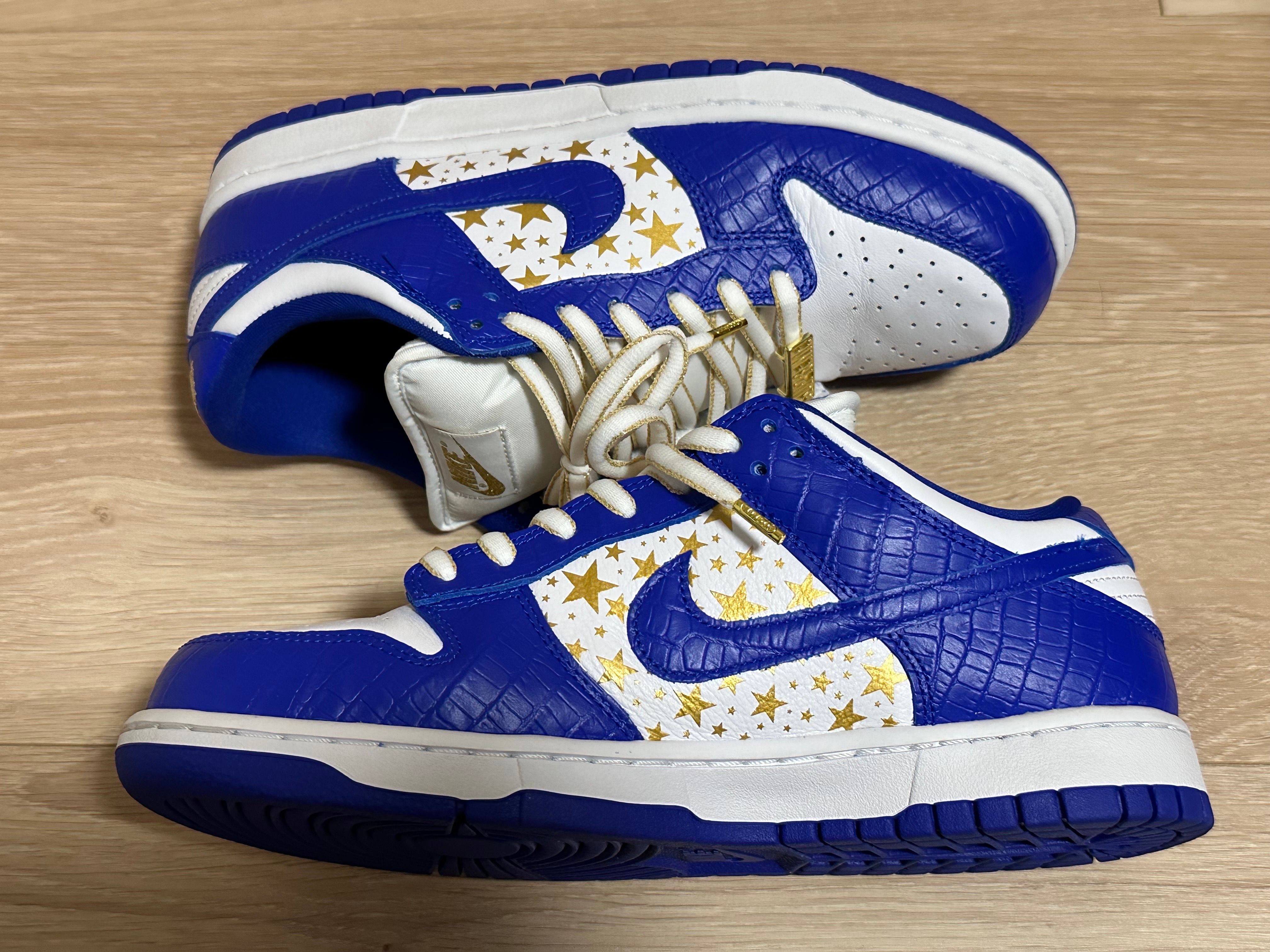 Supreme × Nike SB Dunk Low OG QS Gold Stars "White/Hyper Blue"
