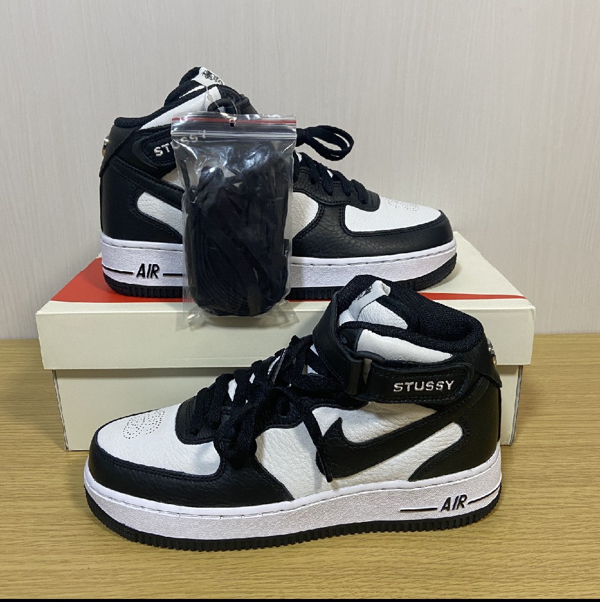 Stussy × Nike Air Force 1 Mid "Black and Light Bone"