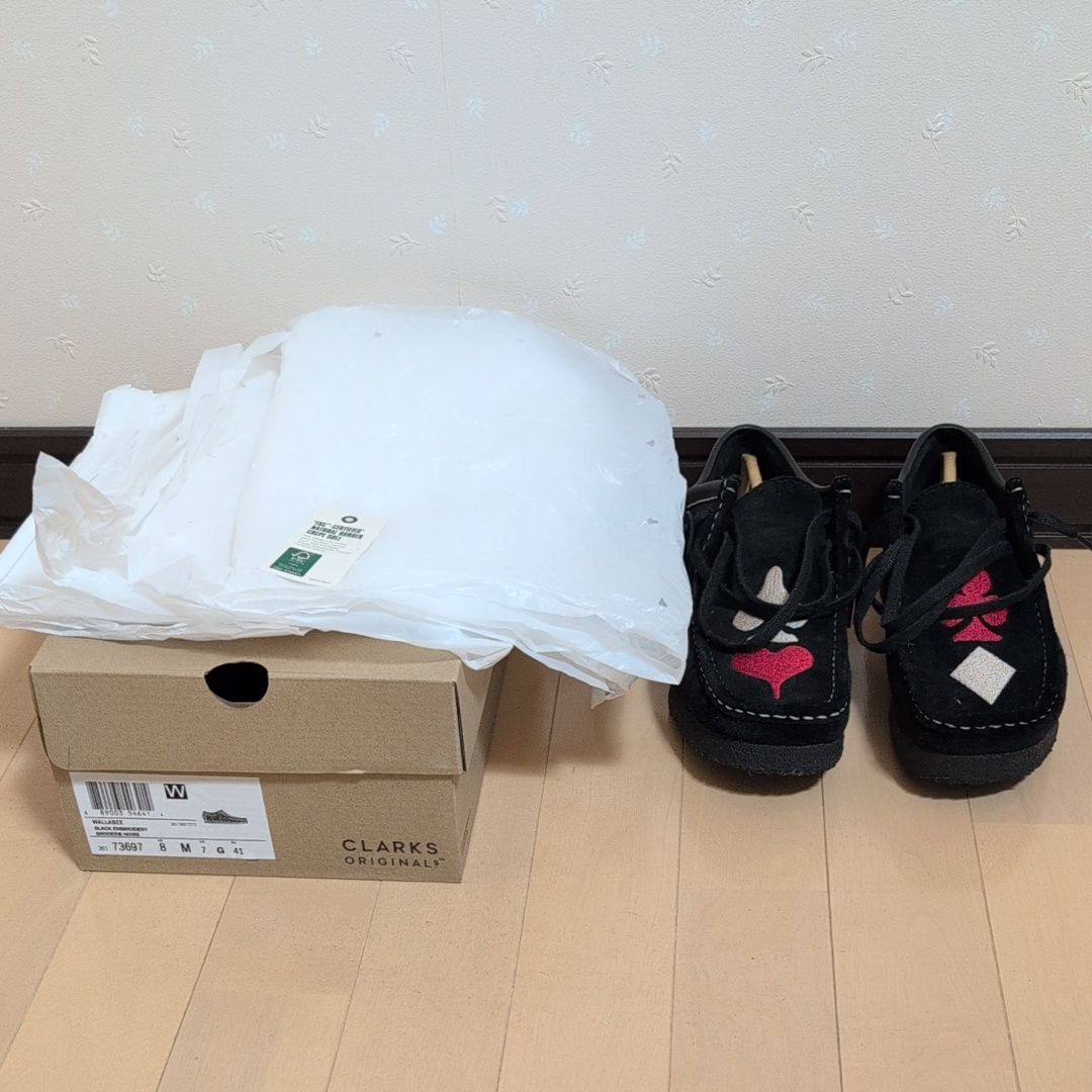 Stussy × Clarks Wallabee "Black Suede/Red/Gold"