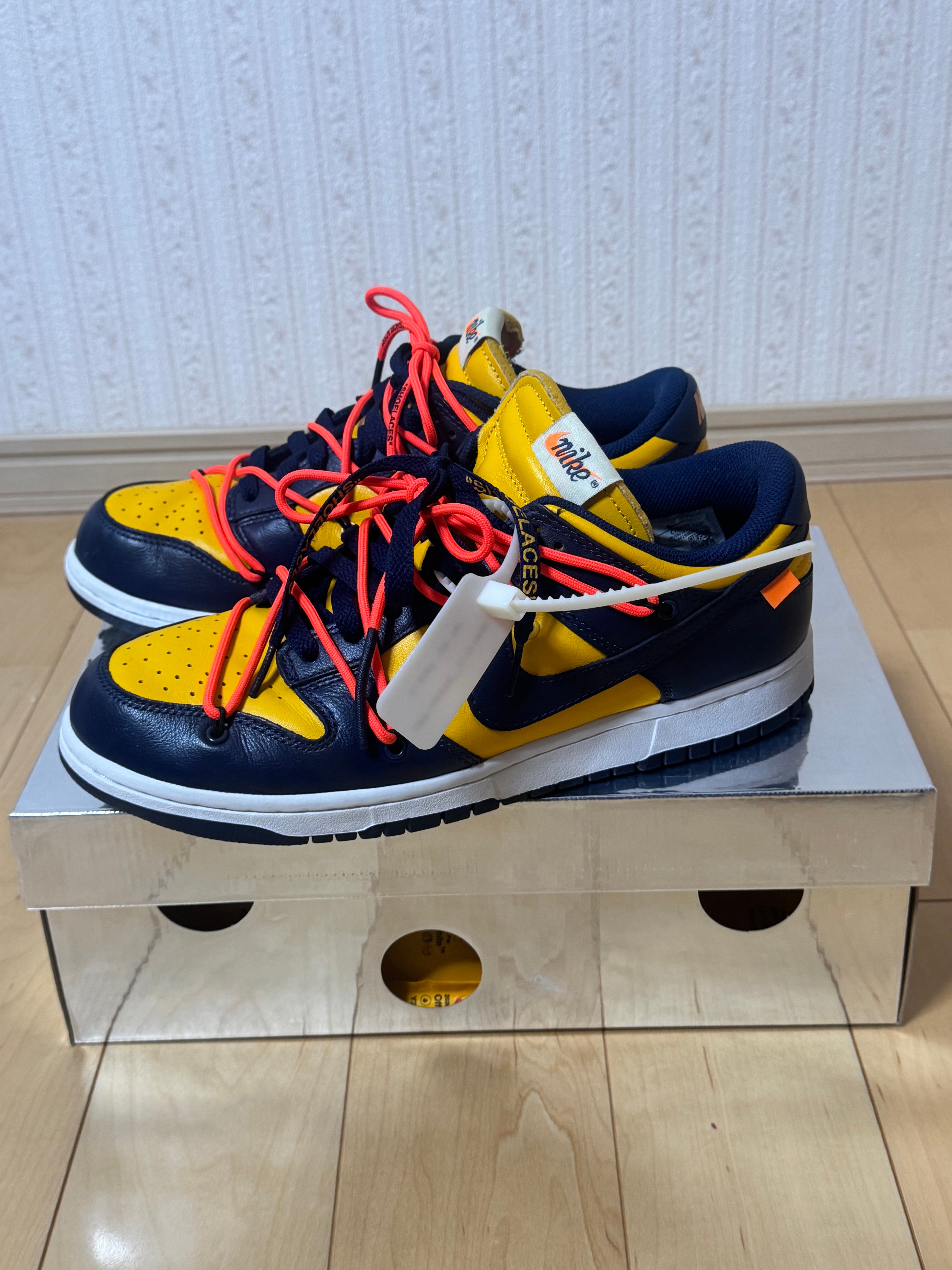 Off-White × Nike Dunk Low LTHR "University Gold/Midnight Navy/White"
