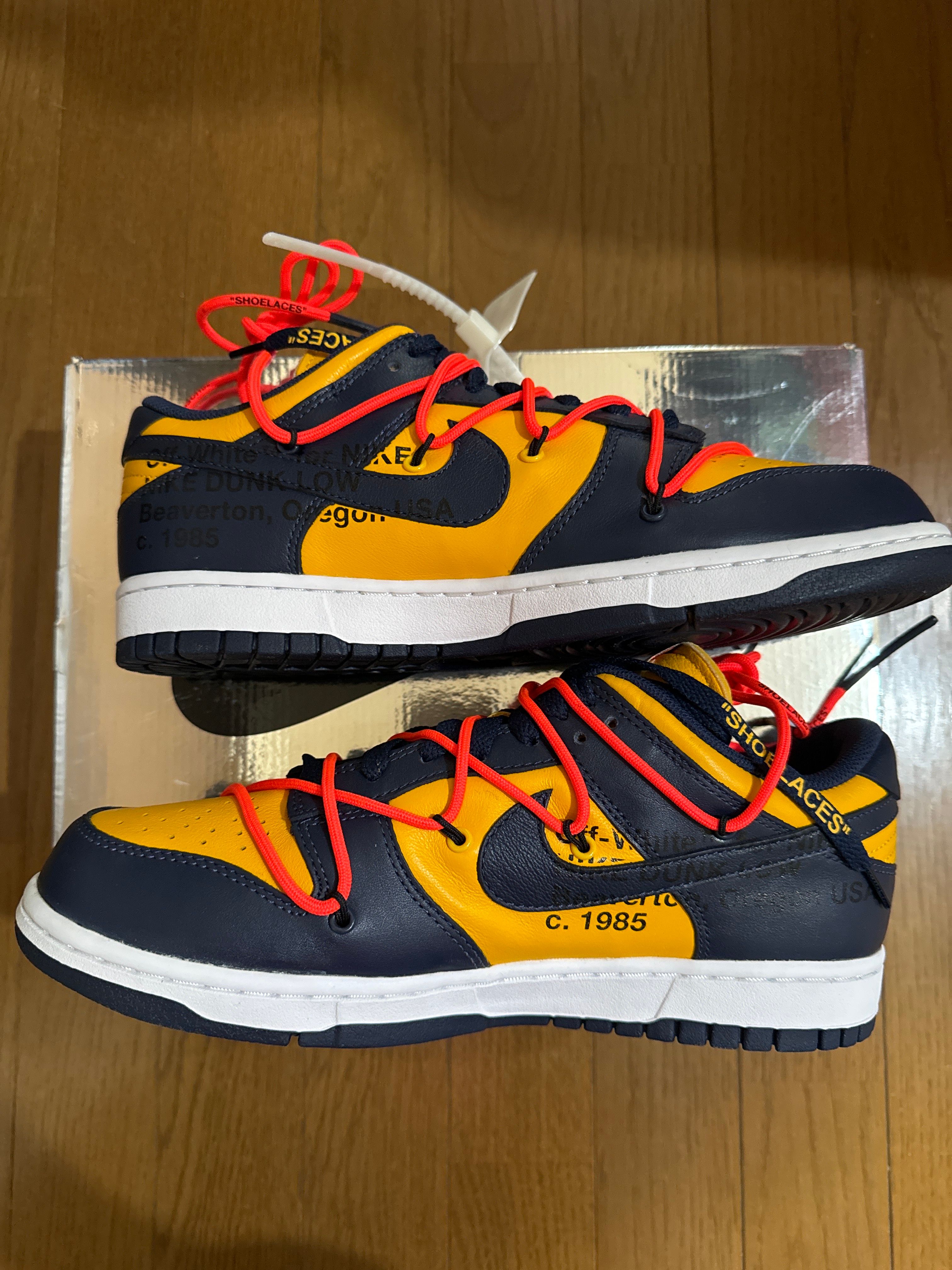 Off-White × Nike Dunk Low LTHR "University Gold/Midnight Navy/White"