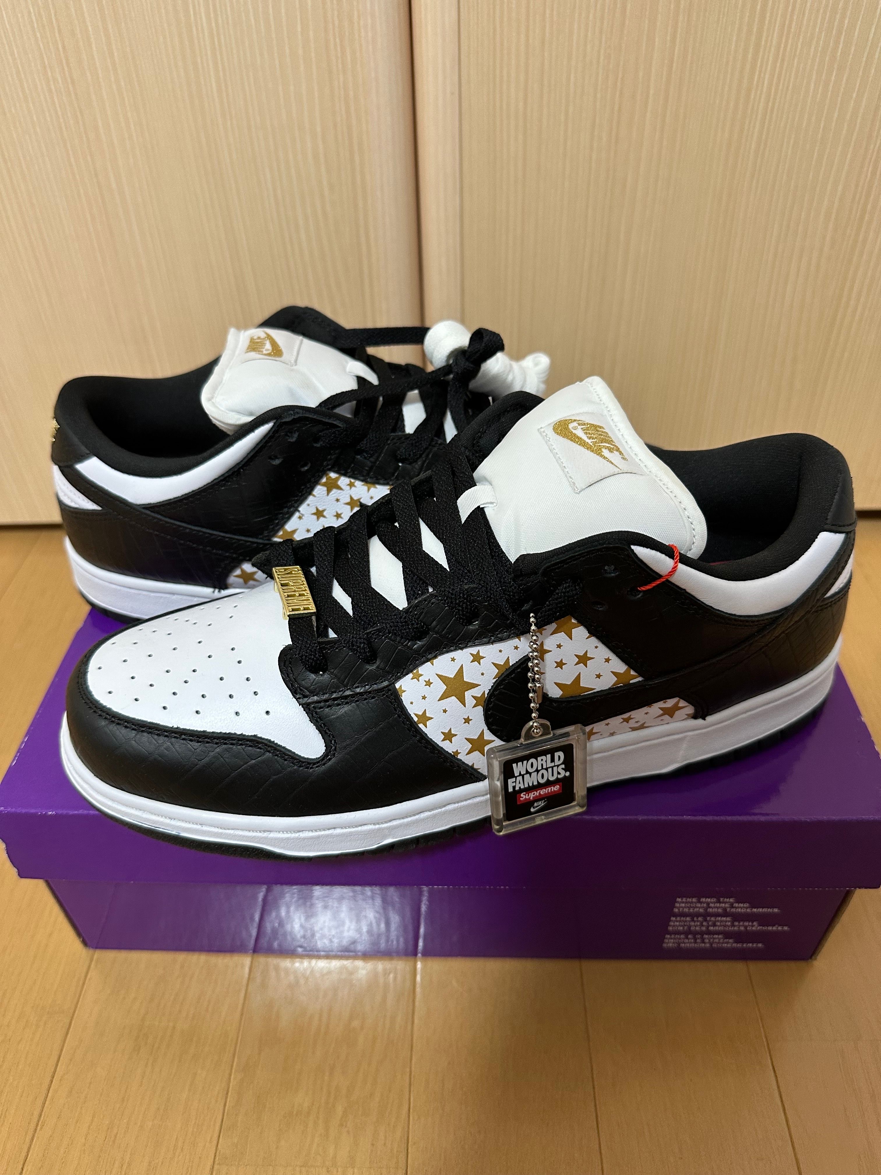 Supreme × Nike SB Dunk Low OG QS Gold Stars "White/Black"