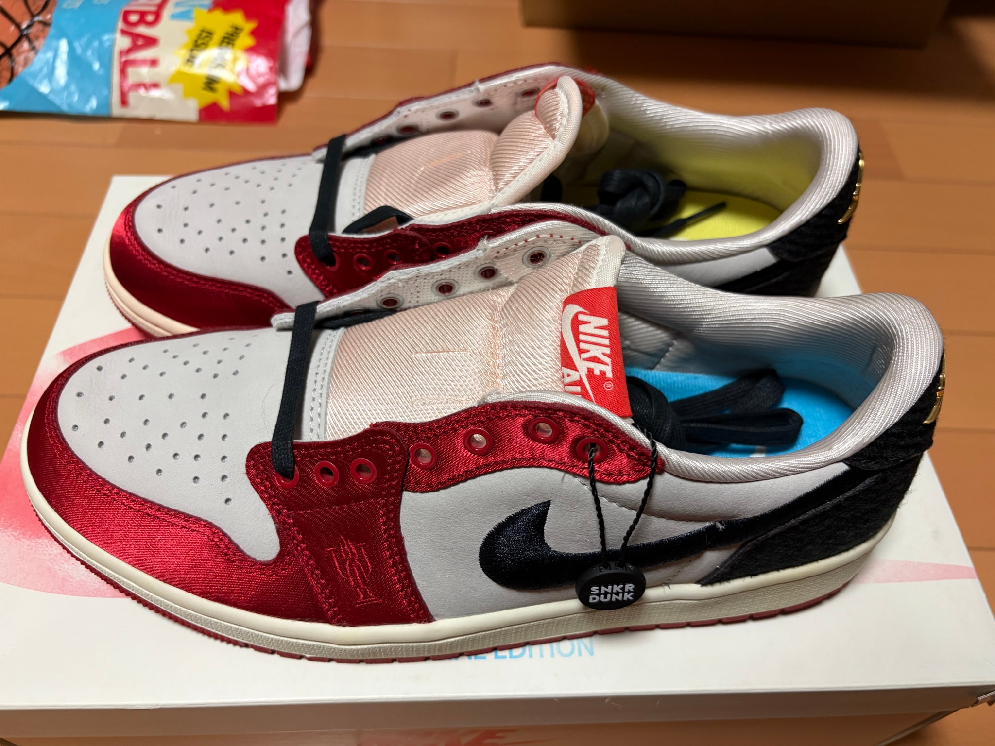 Trophy Room × Nike Air Jordan 1 Low OG "Sail and Varsity Red"