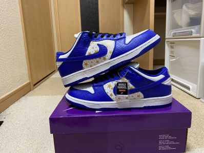 Supreme × Nike SB Dunk Low OG QS Gold Stars "White/Hyper Blue"