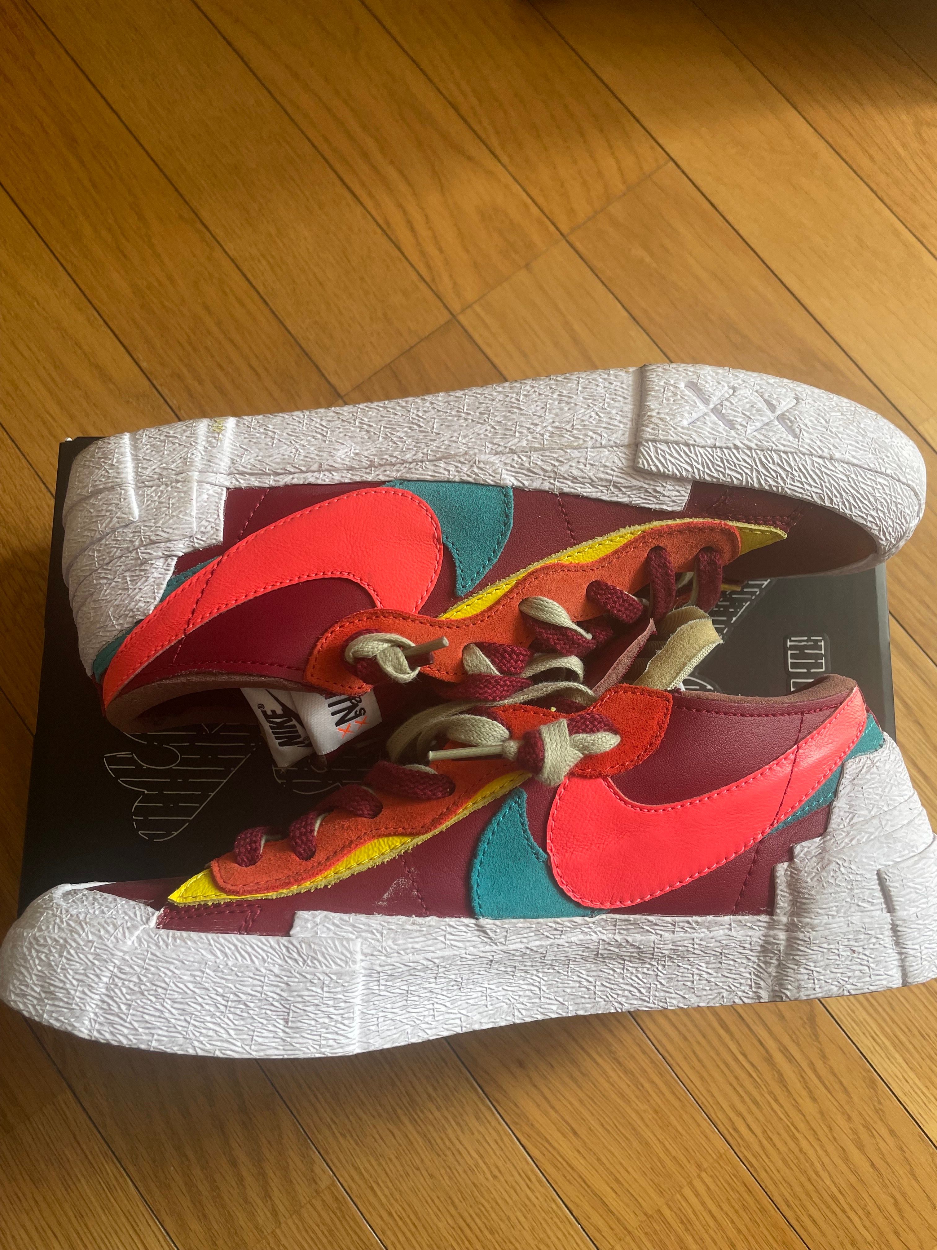 KAWS × sacai × Nike Blazer Low "Team Red"