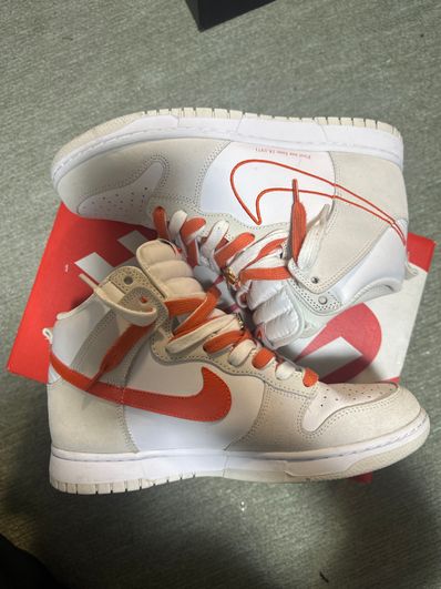 NIKE Women's DUNK HIGH SE FIRST USE "WHITE/ORANGE"