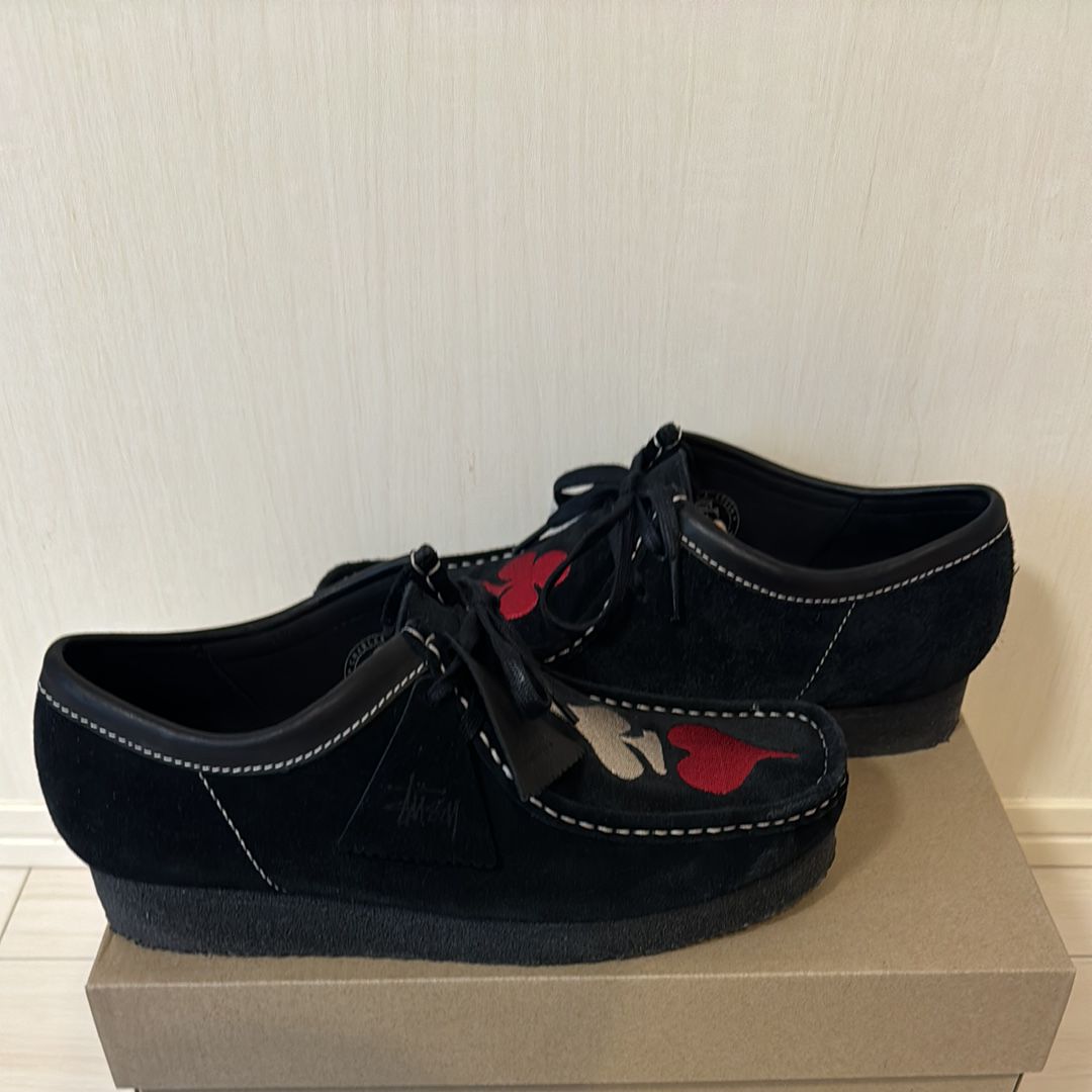Stussy × Clarks Wallabee "Black Suede/Red/Gold"