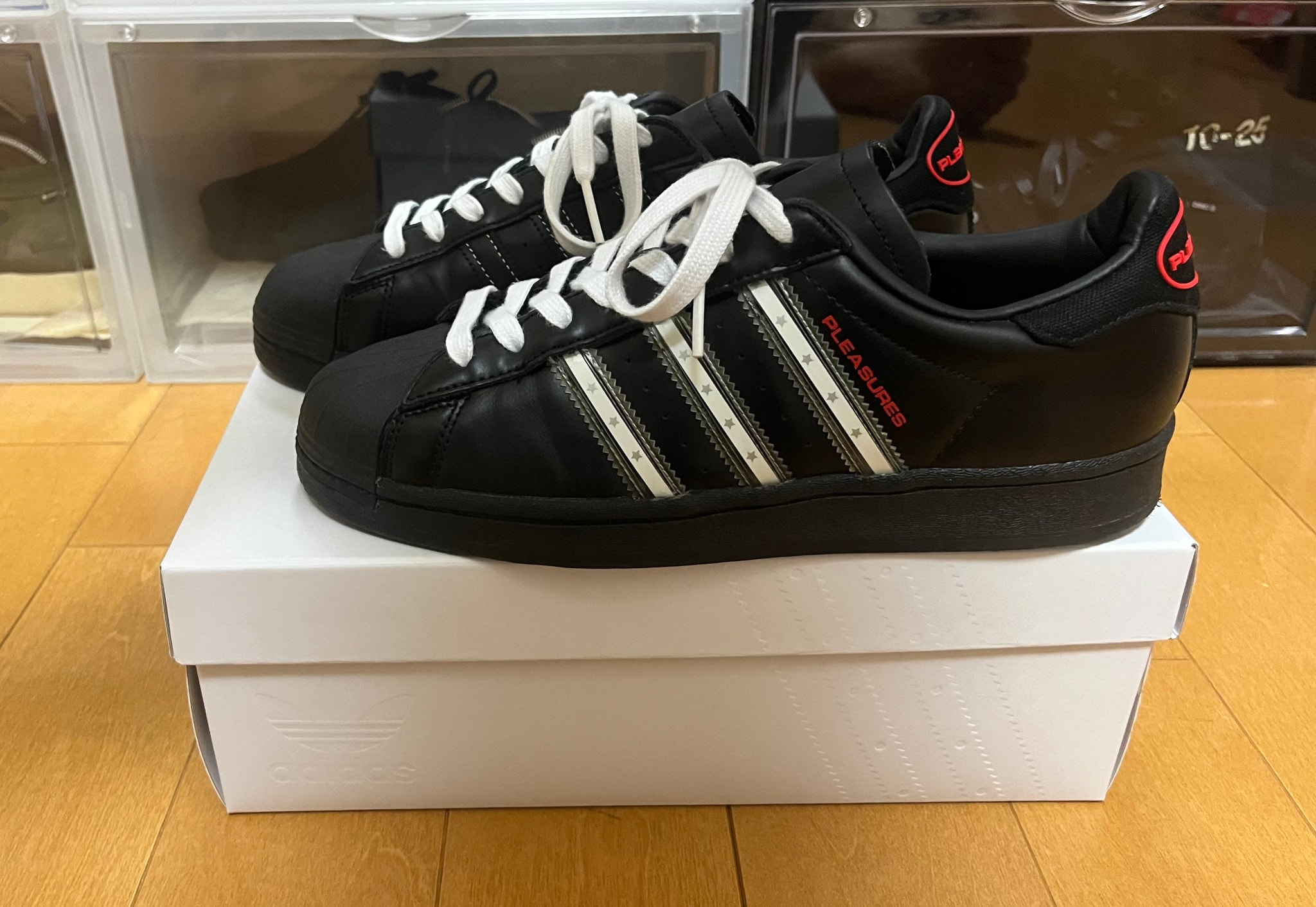 PLEASURES × adidas CONSORTIUM SUPERSTAR "BLACK"