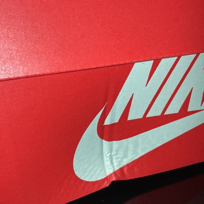 Nike Women's Dunk High UP "Gold/Black"