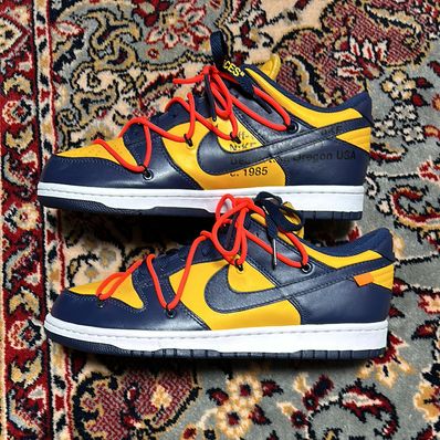 Off-White × Nike Dunk Low LTHR "University Gold/Midnight Navy/White"