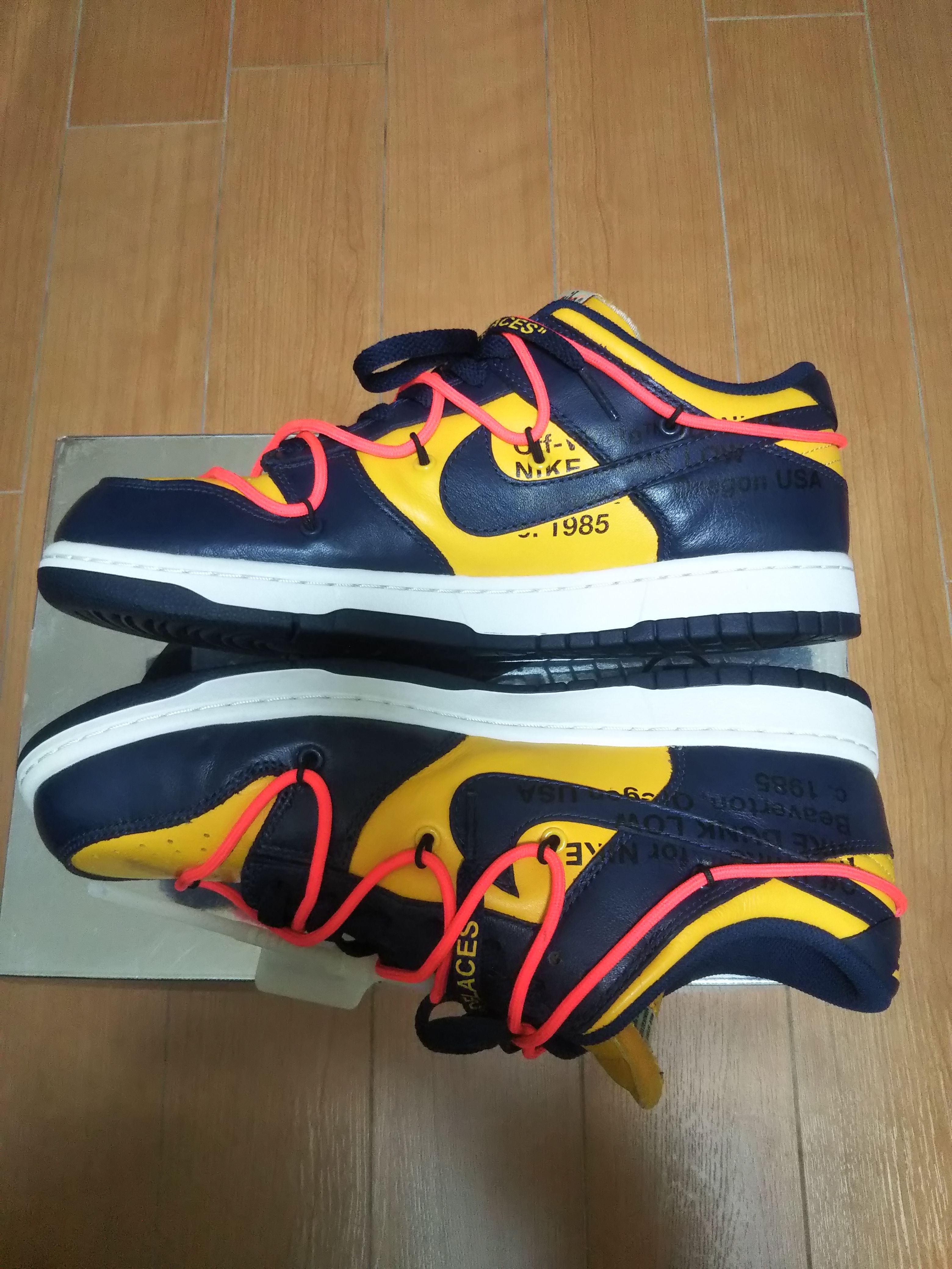 Off-White × Nike Dunk Low LTHR "University Gold/Midnight Navy/White"