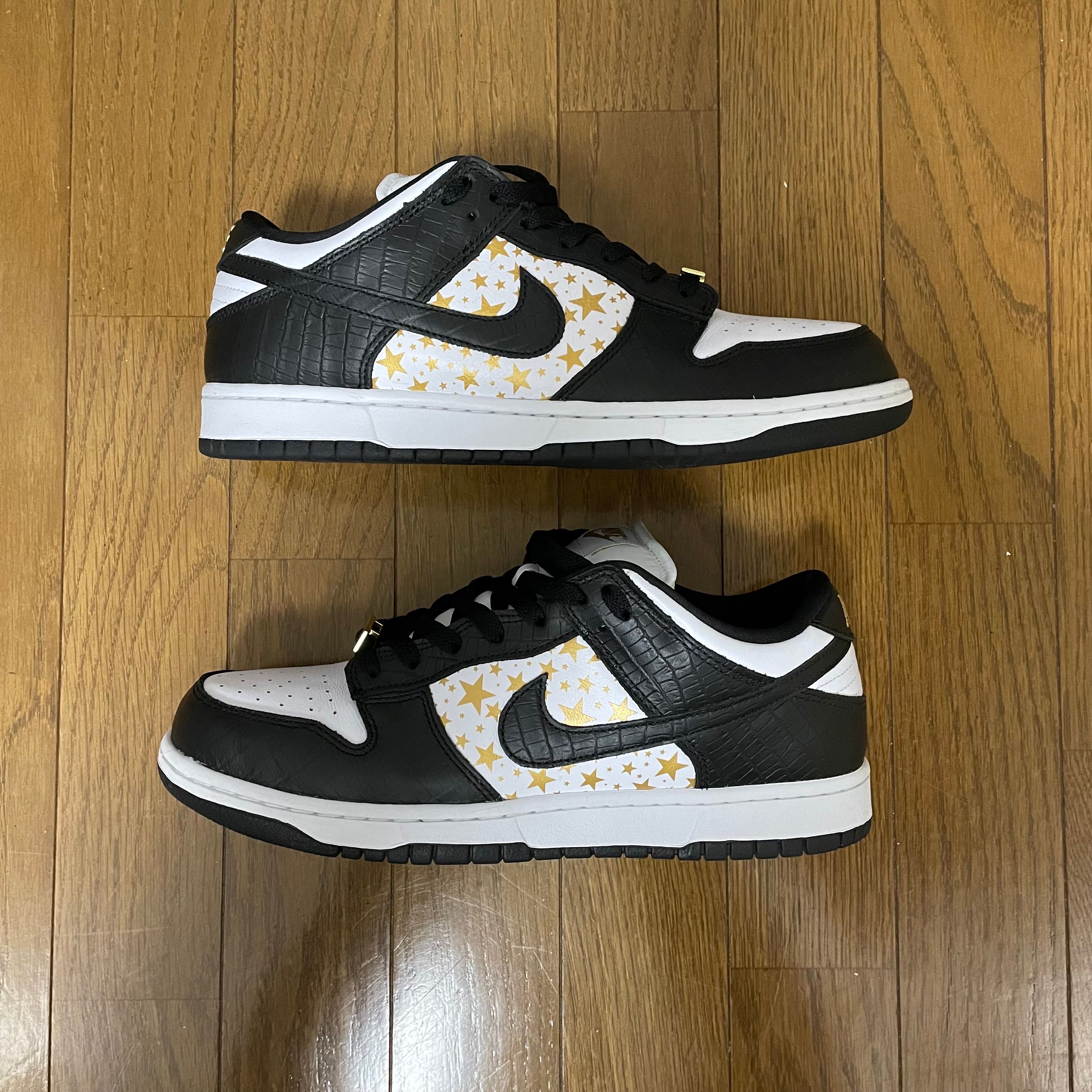 Supreme × Nike SB Dunk Low OG QS Gold Stars "White/Black"