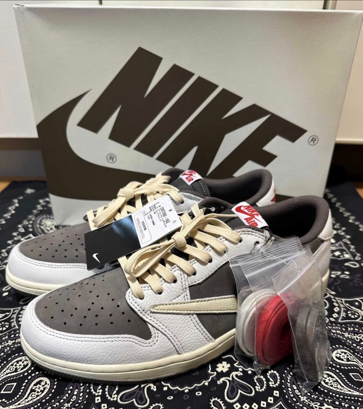 Travis Scott × Nike Air Jordan 1 Low OG SP "Reverse Mocha/Sail and Ridgerock"