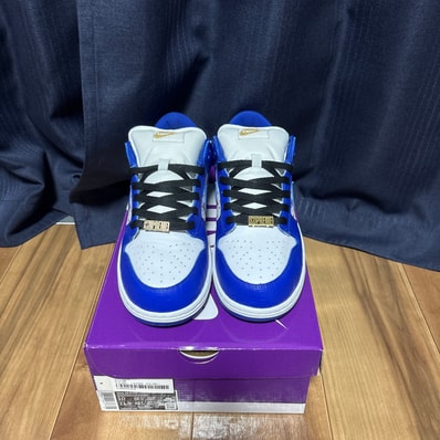 Supreme × Nike SB Dunk Low OG QS Gold Stars "White/Hyper Blue"