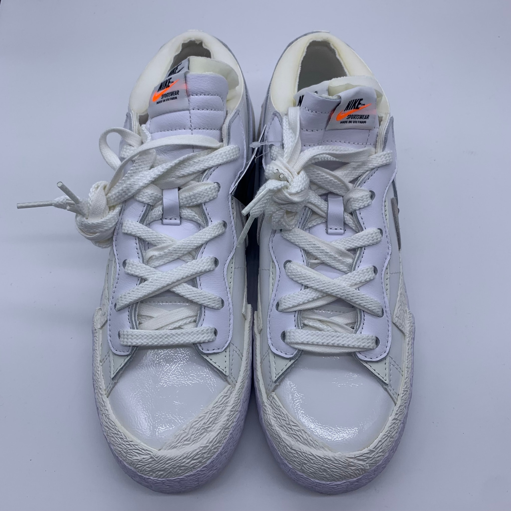 sacai × Nike Blazer Low "White Patent Leather"
