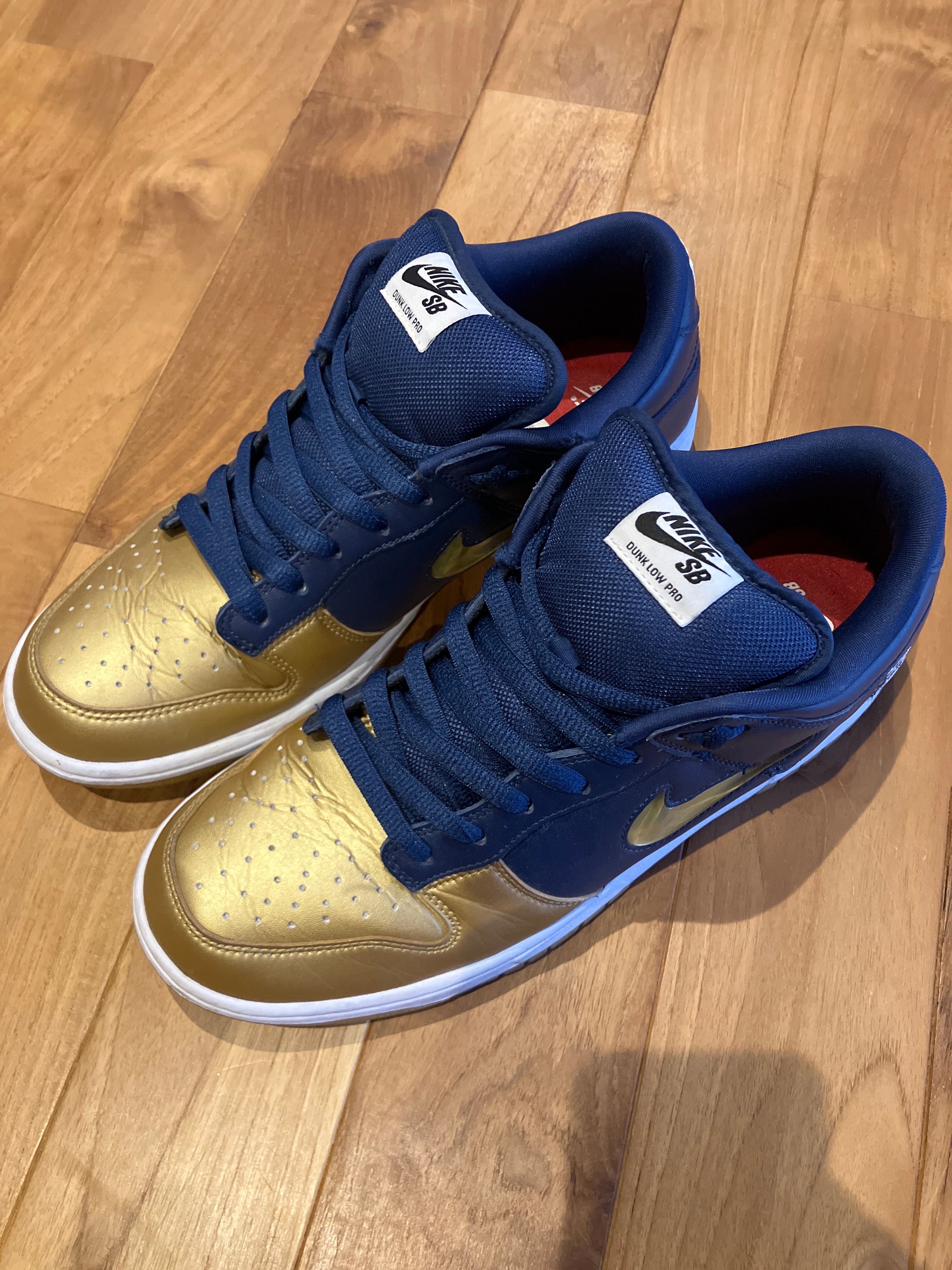 Supreme × Nike SB Dunk Low OG QS "Metallic Gold/Navy"