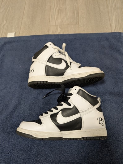 Supreme × Nike SB Dunk High By Any Means "White Black"