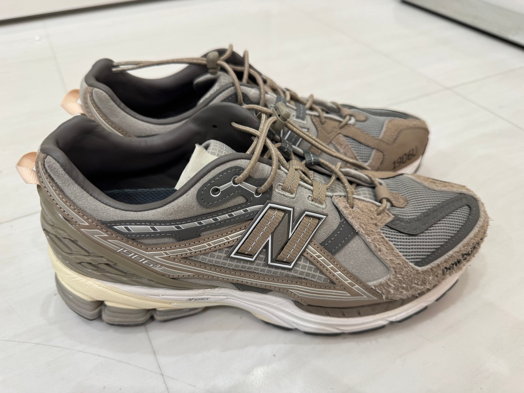 INVINCIBLE × N.HOOLYWOOD × New Balance 1906U "Gray Titan"