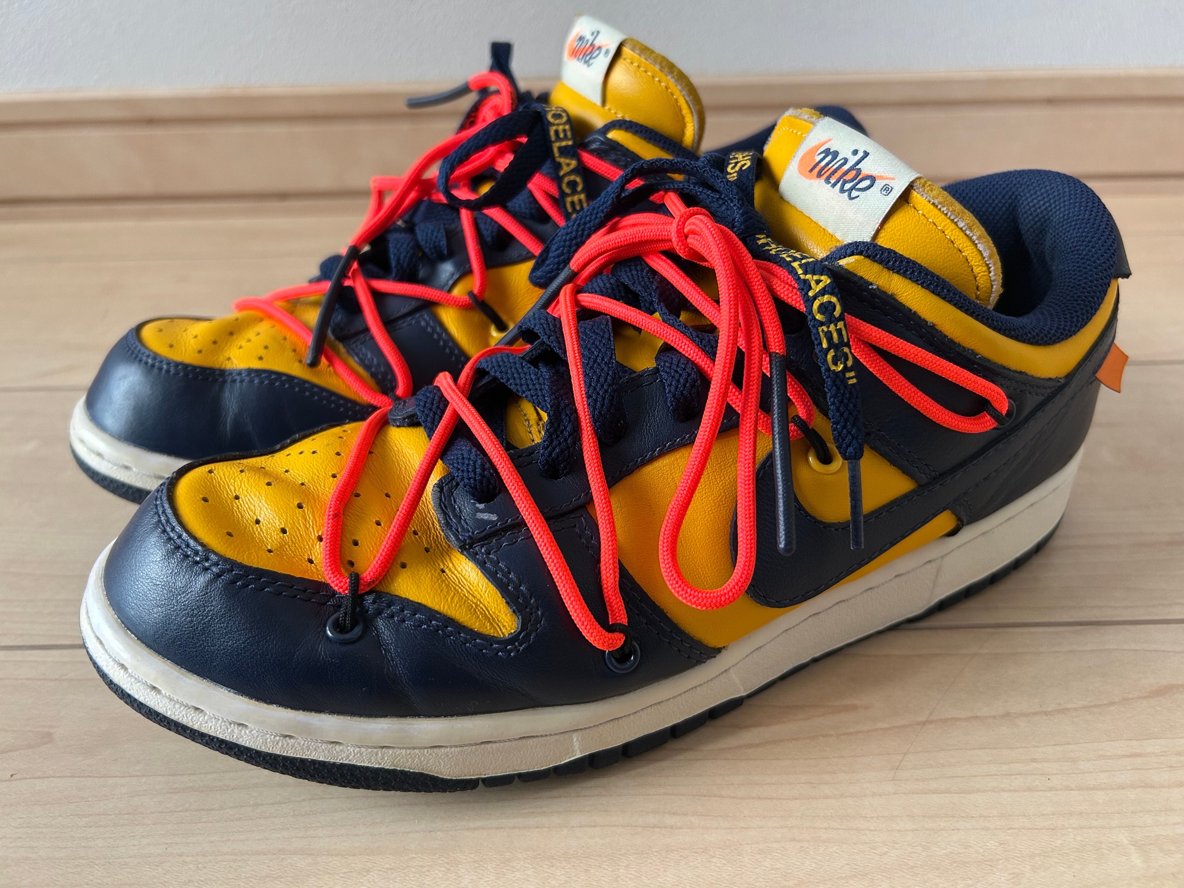 Off-White × Nike Dunk Low LTHR "University Gold/Midnight Navy/White"