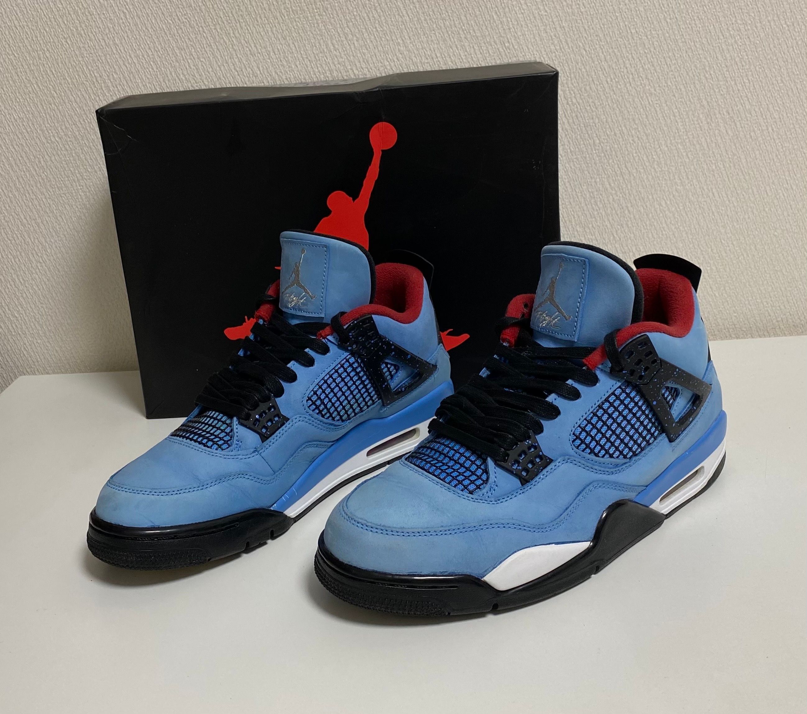 Travis Scott × Nike Air Jordan 4 Retro Cactus Jack "University Blue"