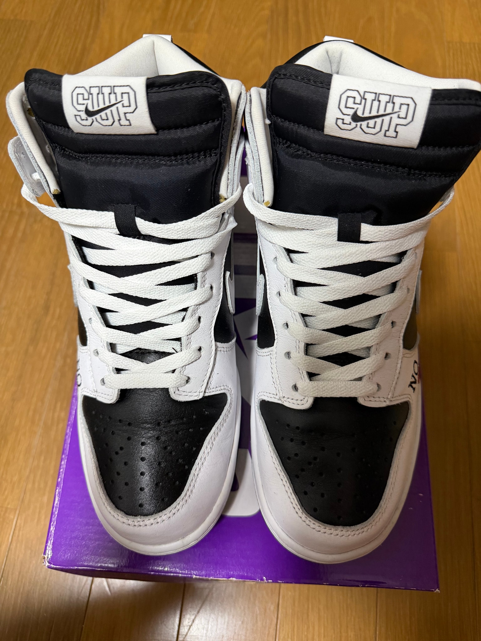 Supreme × Nike SB Dunk High By Any Means "White Black"