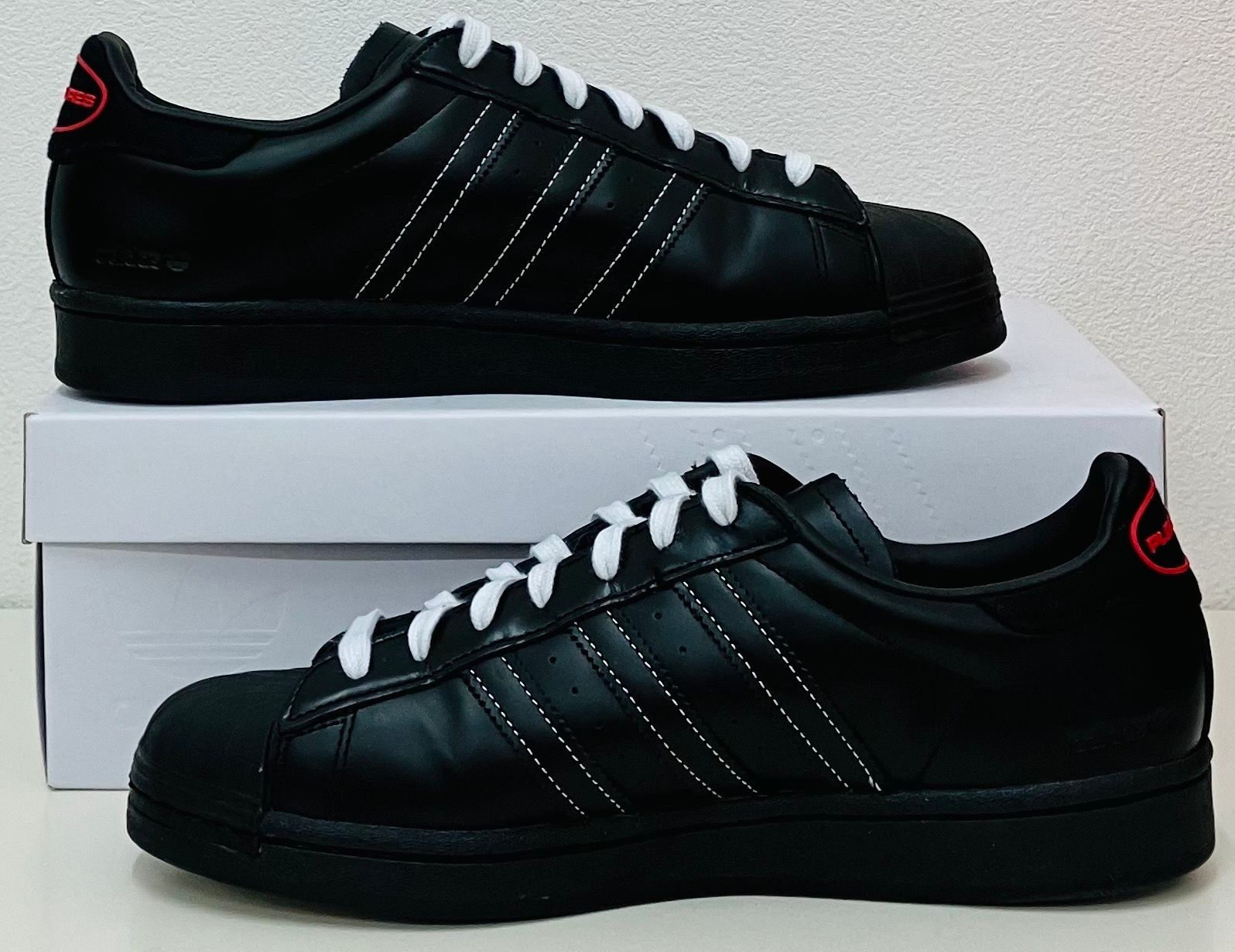 PLEASURES × adidas CONSORTIUM SUPERSTAR "BLACK"