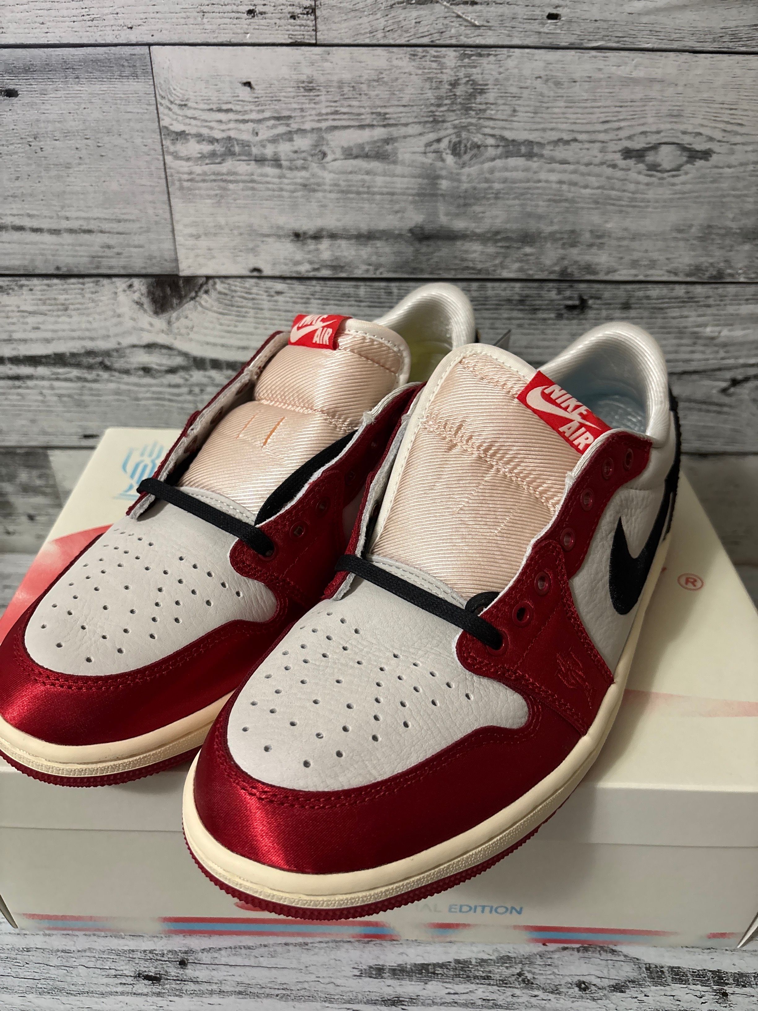 Trophy Room × Nike Air Jordan 1 Low OG "Sail and Varsity Red"