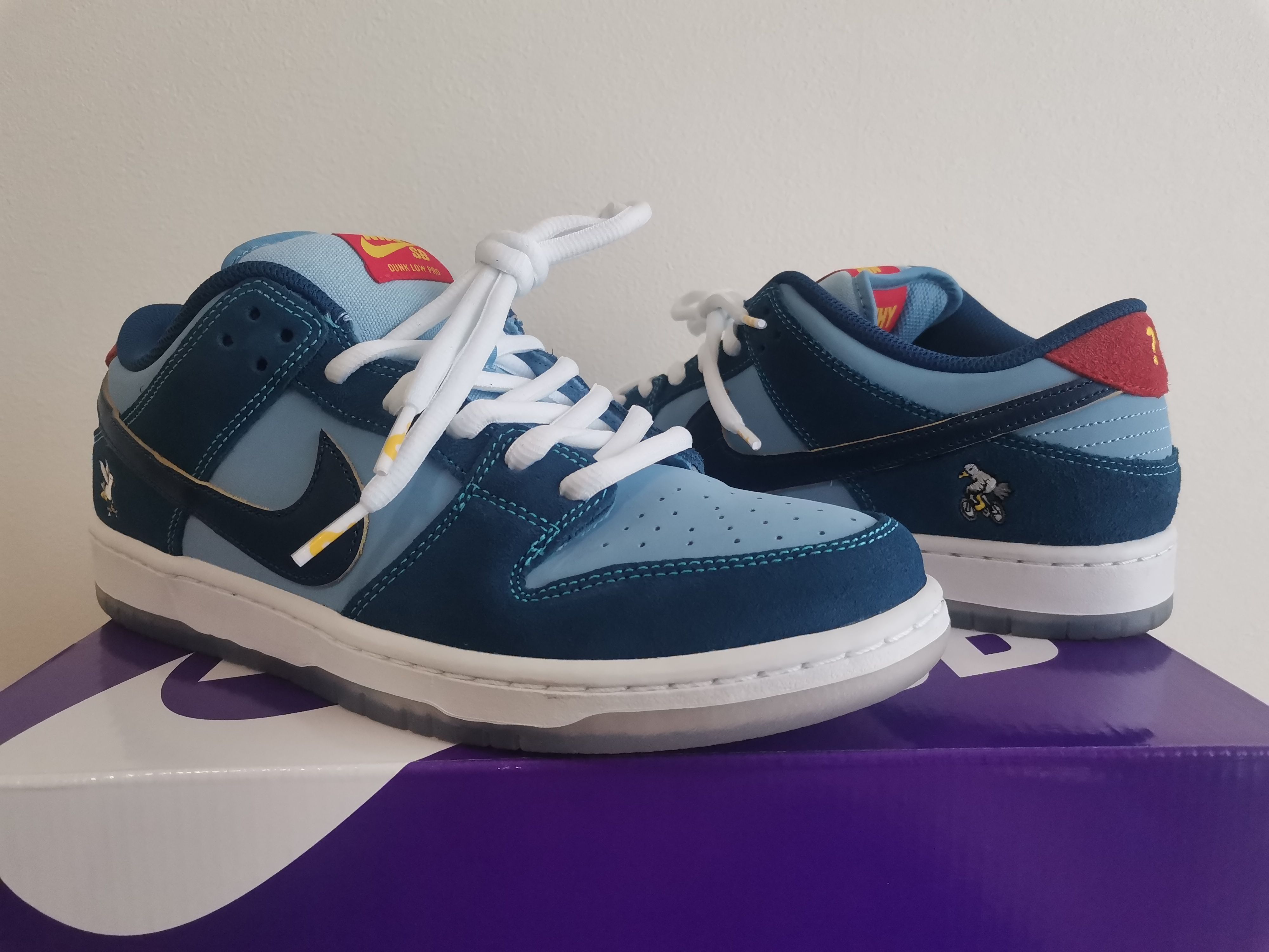 Why So Sad? × Nike SB Dunk Low "Coastal Blue/Speed Yellow-University Red"