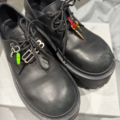 BALENCIAGA Women's Strike Platform Derby With Charms "Black"