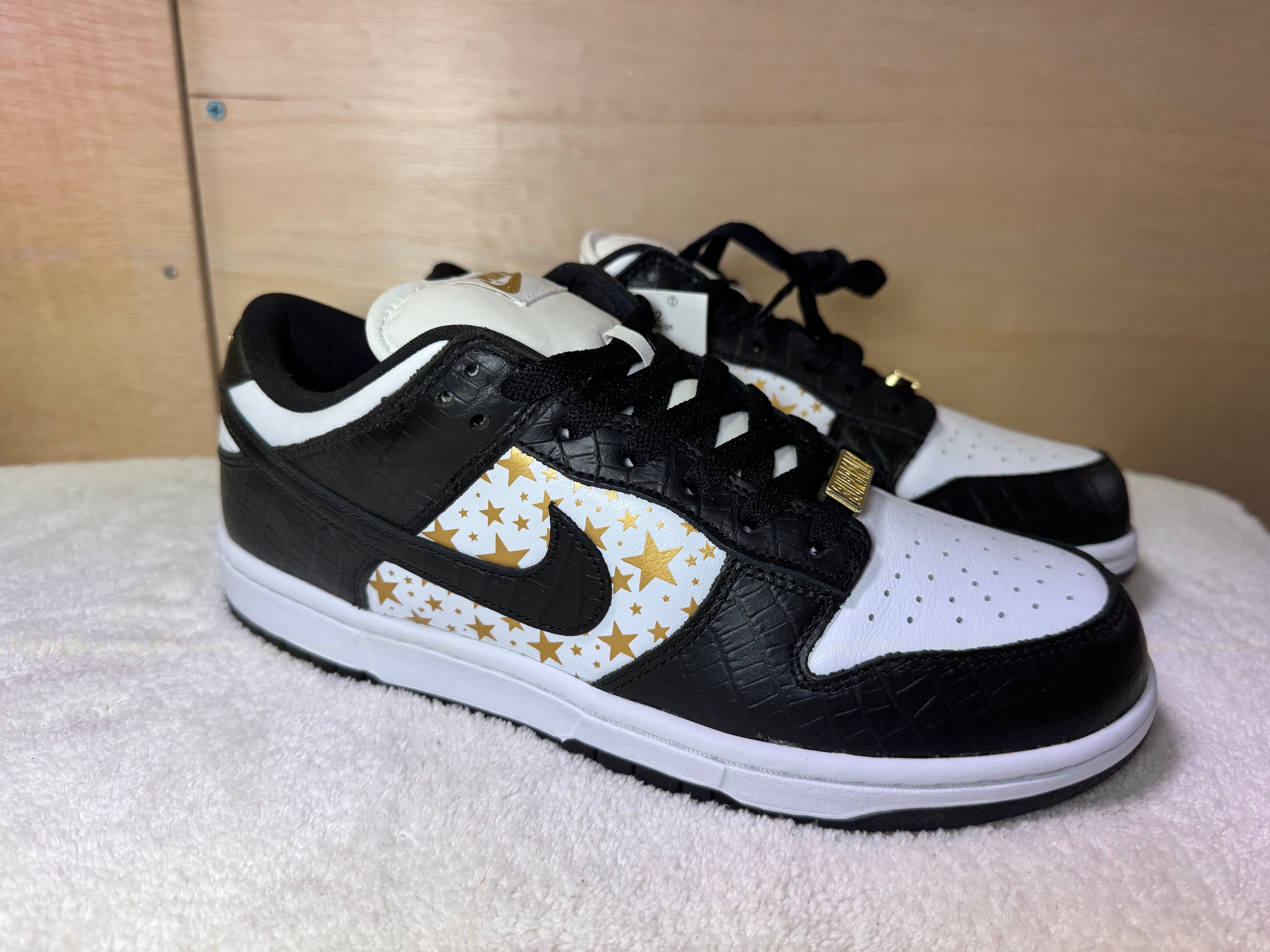Supreme × Nike SB Dunk Low OG QS Gold Stars 